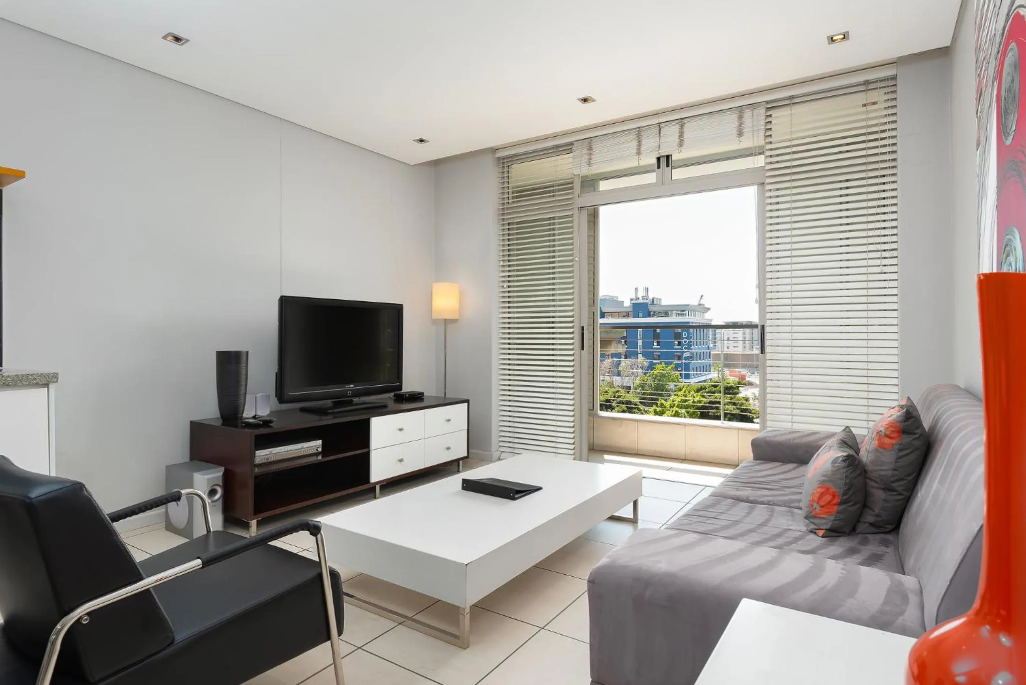 TV and multimedia, Seating Area in HarbourEdge Suites by Totalstay