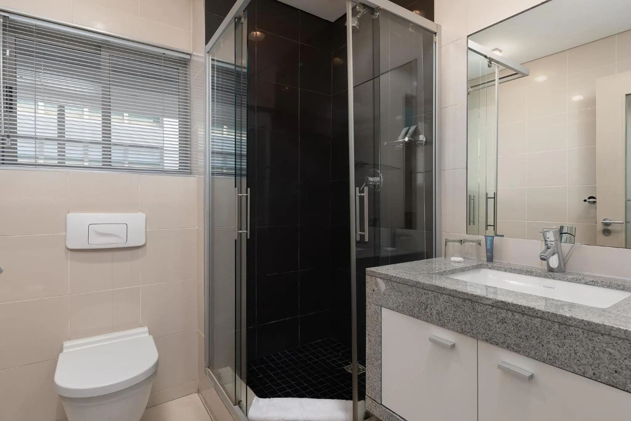 Bathroom in HarbourEdge Suites by Totalstay