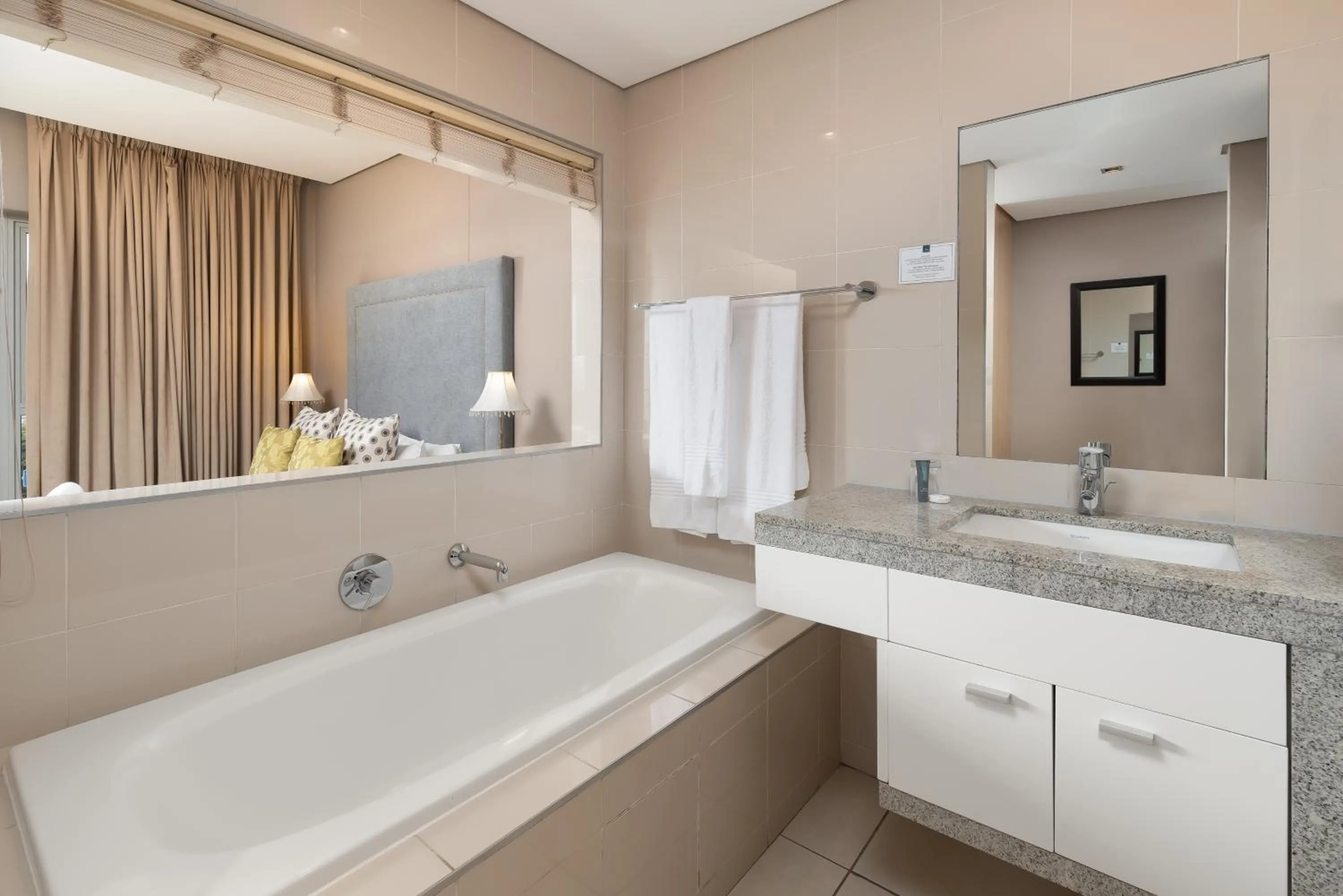 Bathroom in HarbourEdge Suites by Totalstay