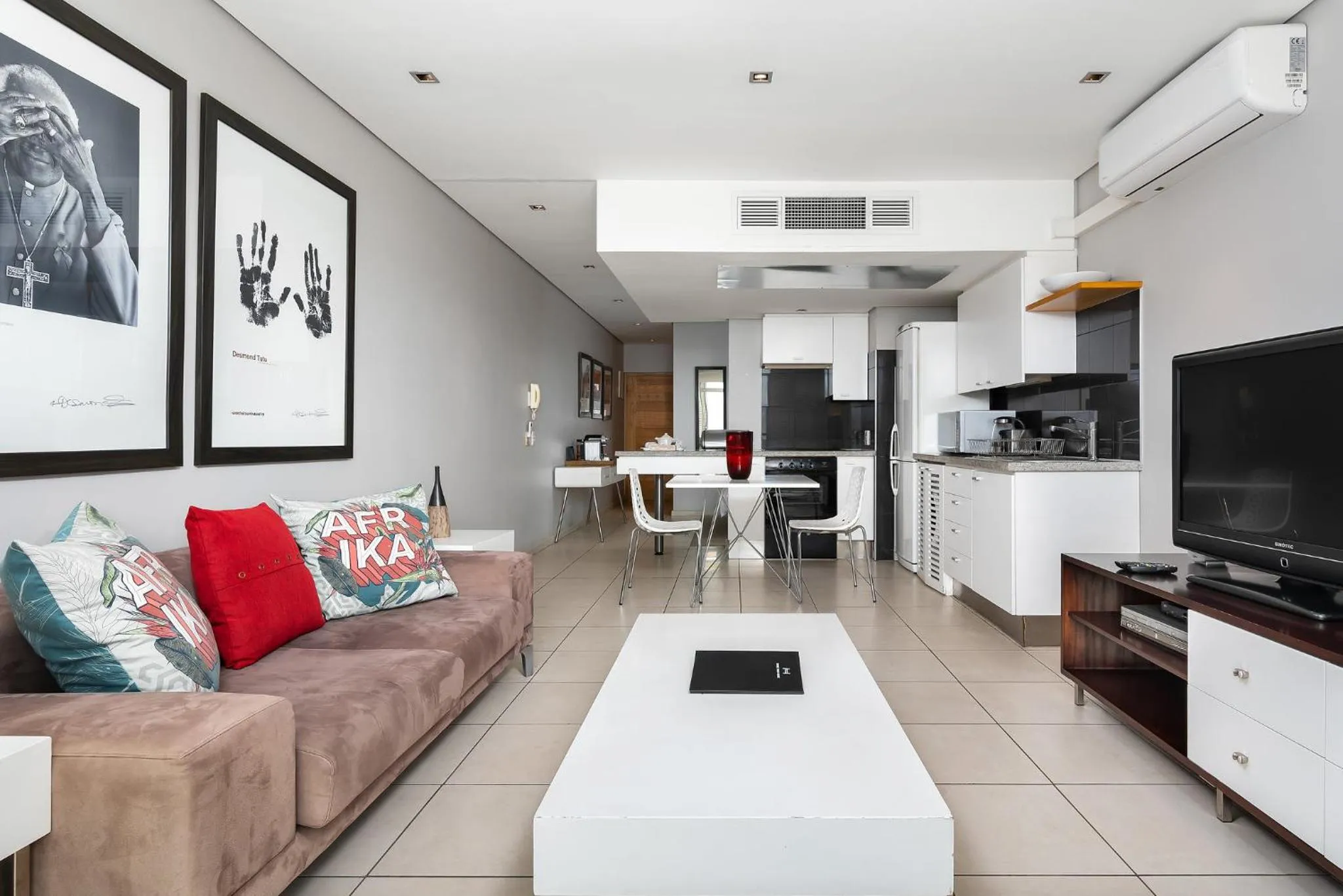 Seating area in HarbourEdge Suites by Totalstay