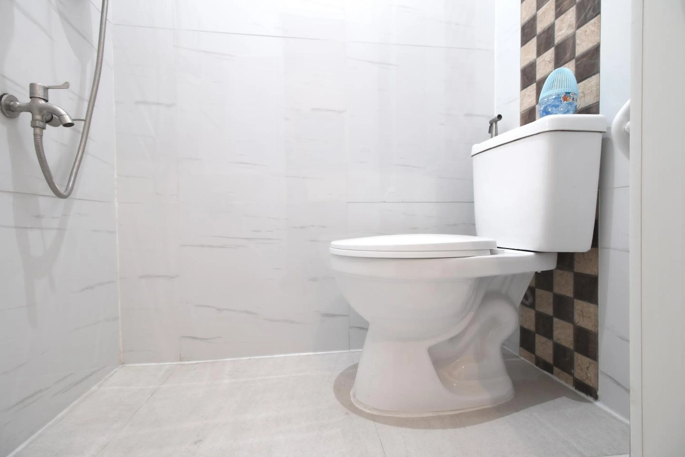 Bathroom in OYO 685 K Fortune Apartelle