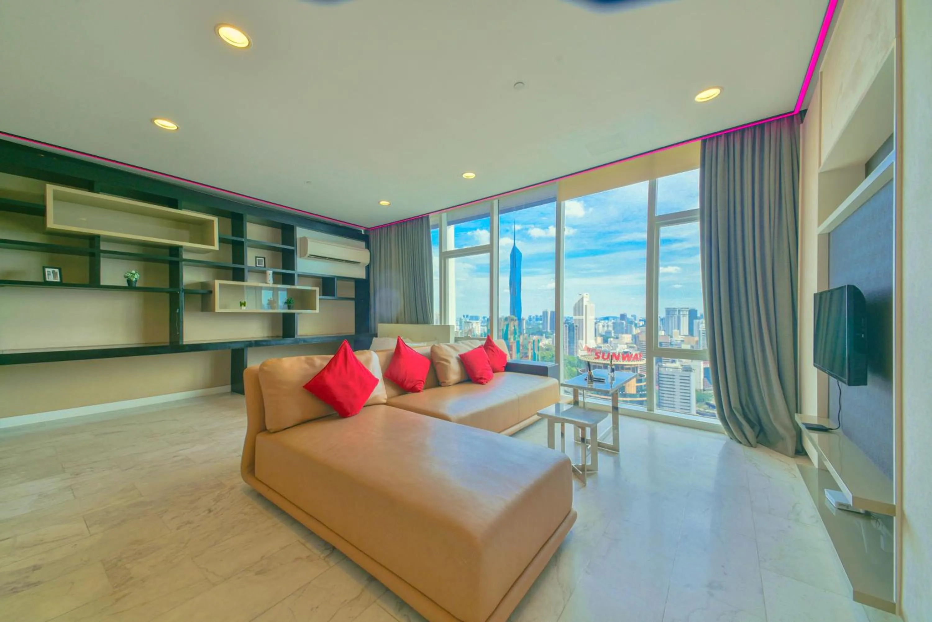 Living room, Bed in Flixses Suites at Platinum KLCC