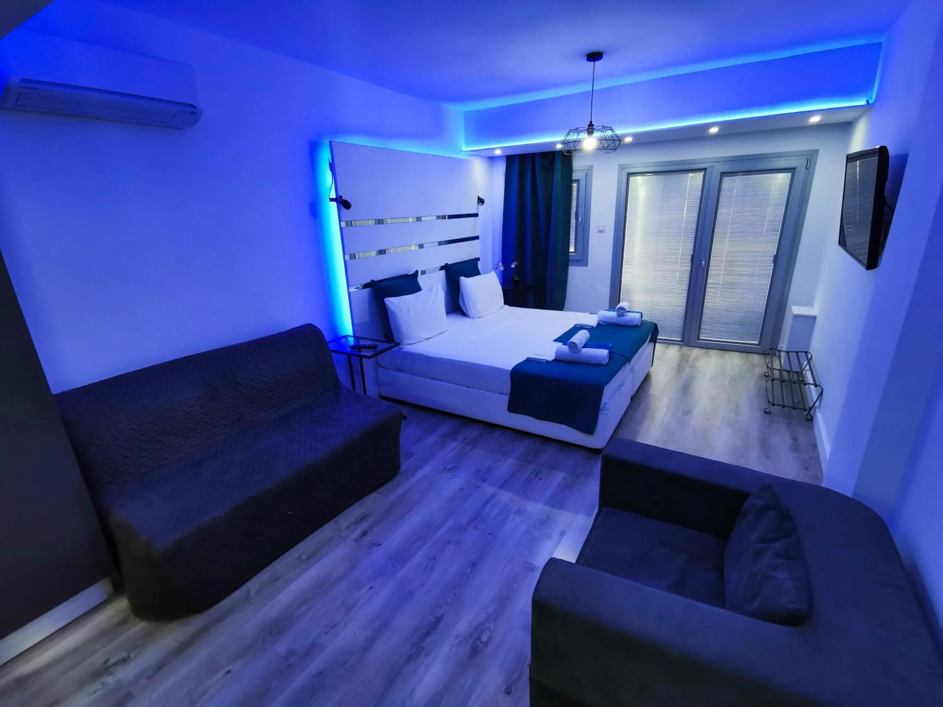 Bedroom in Mariandry Apartments