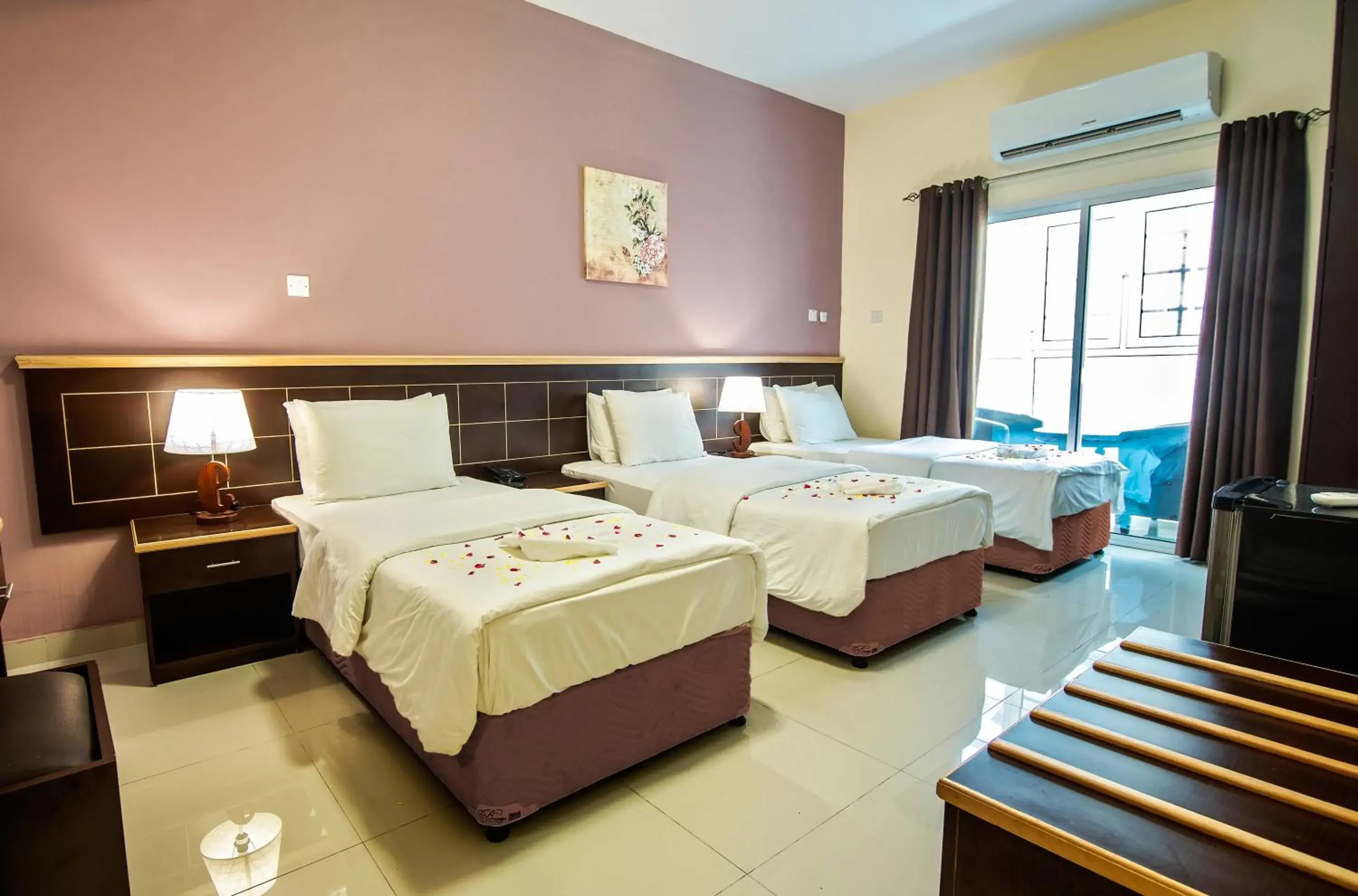 Standard Triple Room in Mutrah Hotel Standard Triple Room in Mutrah Hotel