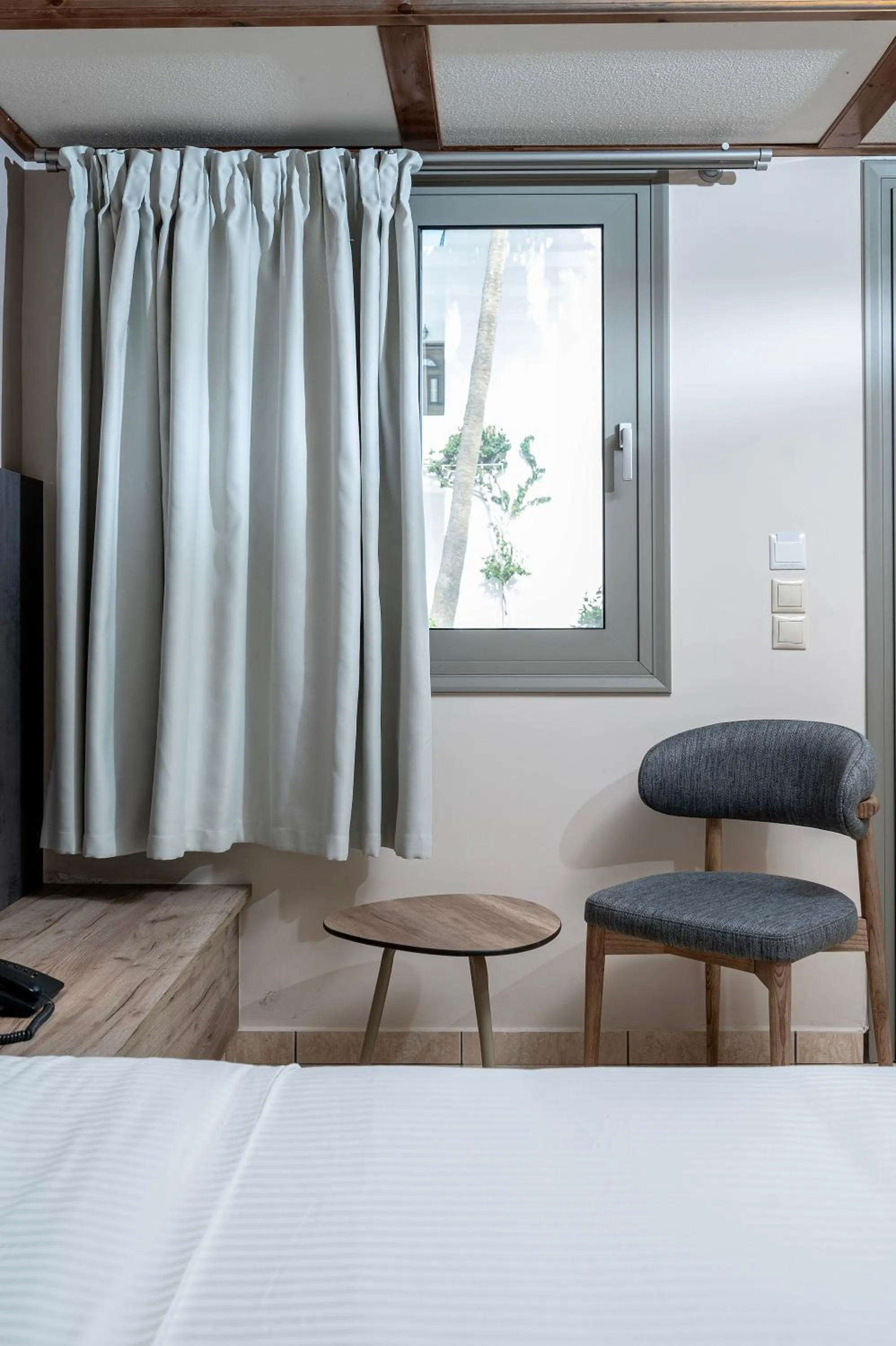 Seating area, Bed in Palladium hotel