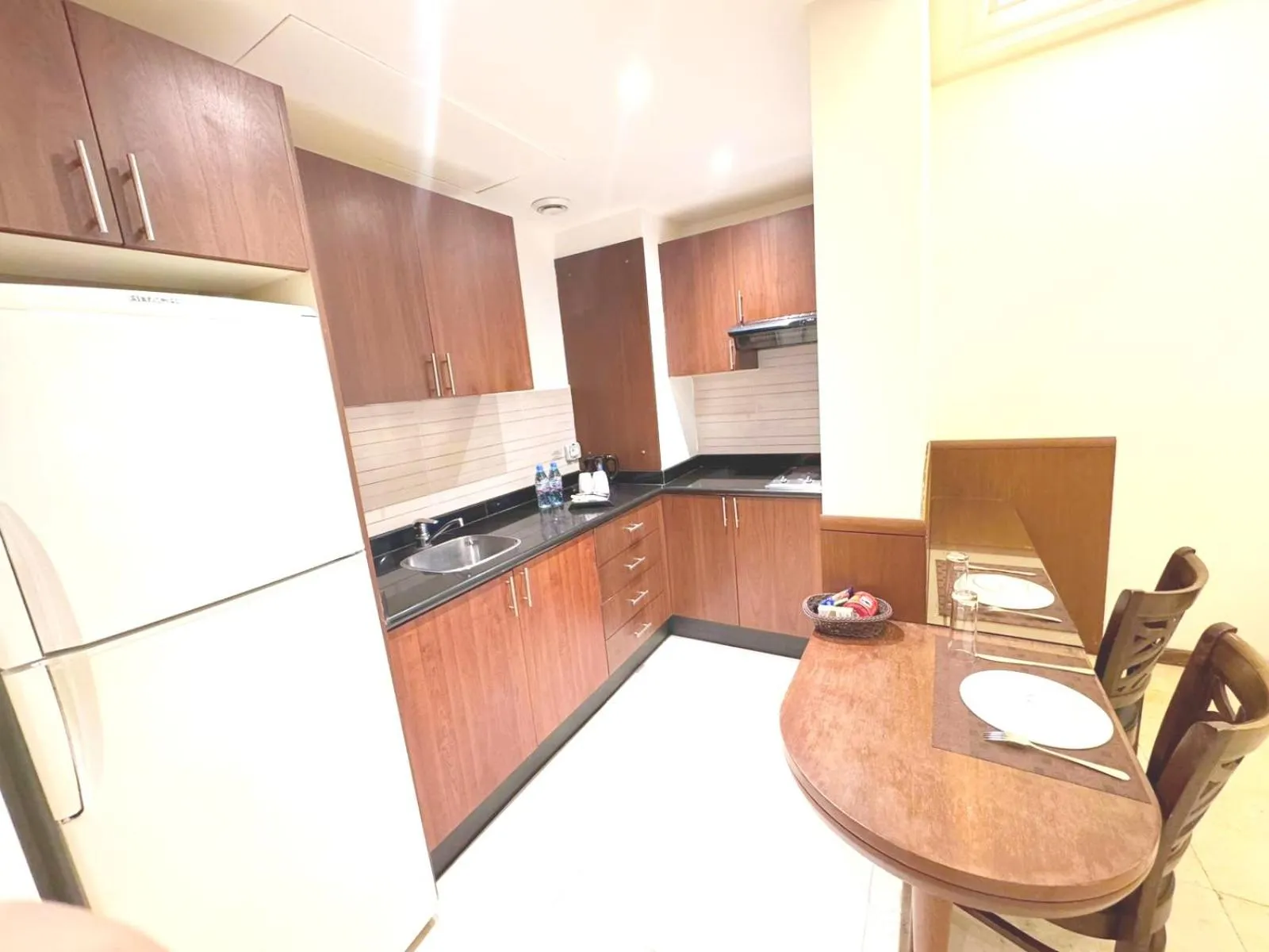 Kitchen or kitchenette in King Suites Hotel