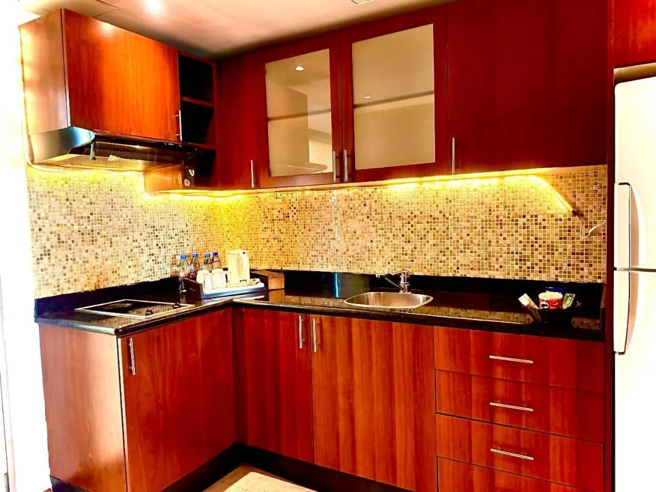 Kitchen or kitchenette in King Suites Hotel