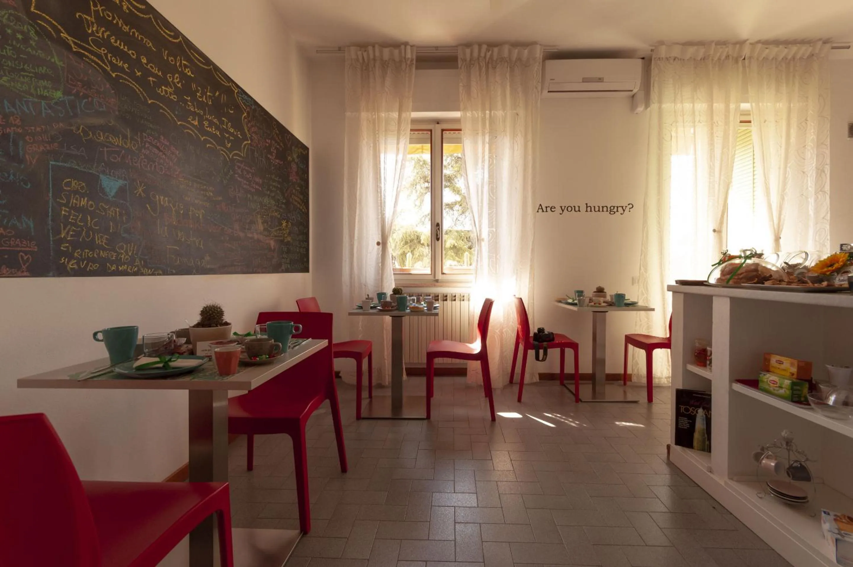 Dining area in B&B Cento Passi Dalle Mura