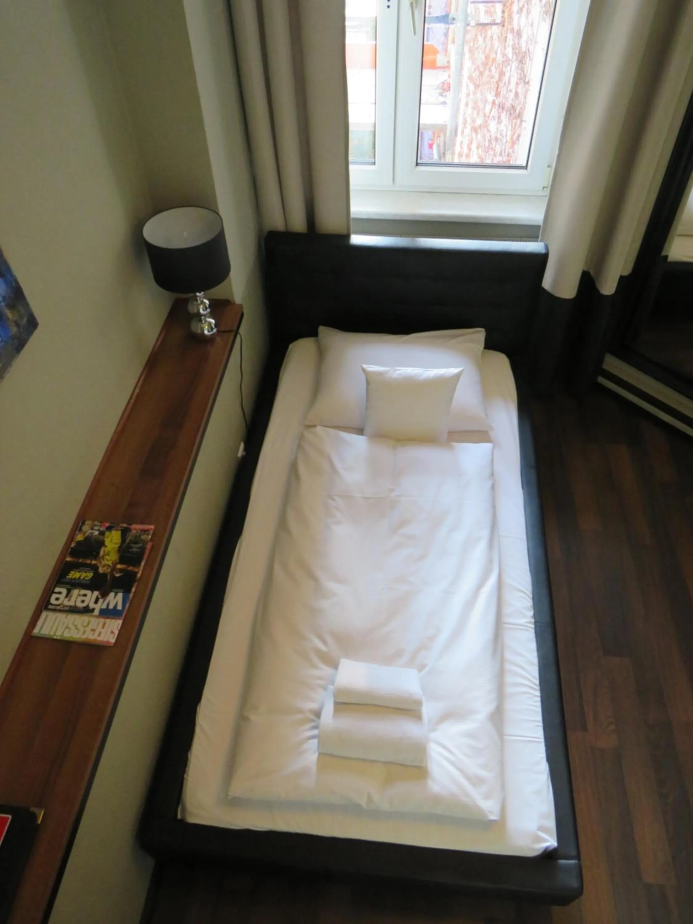 Bed in ArtHotel Connection