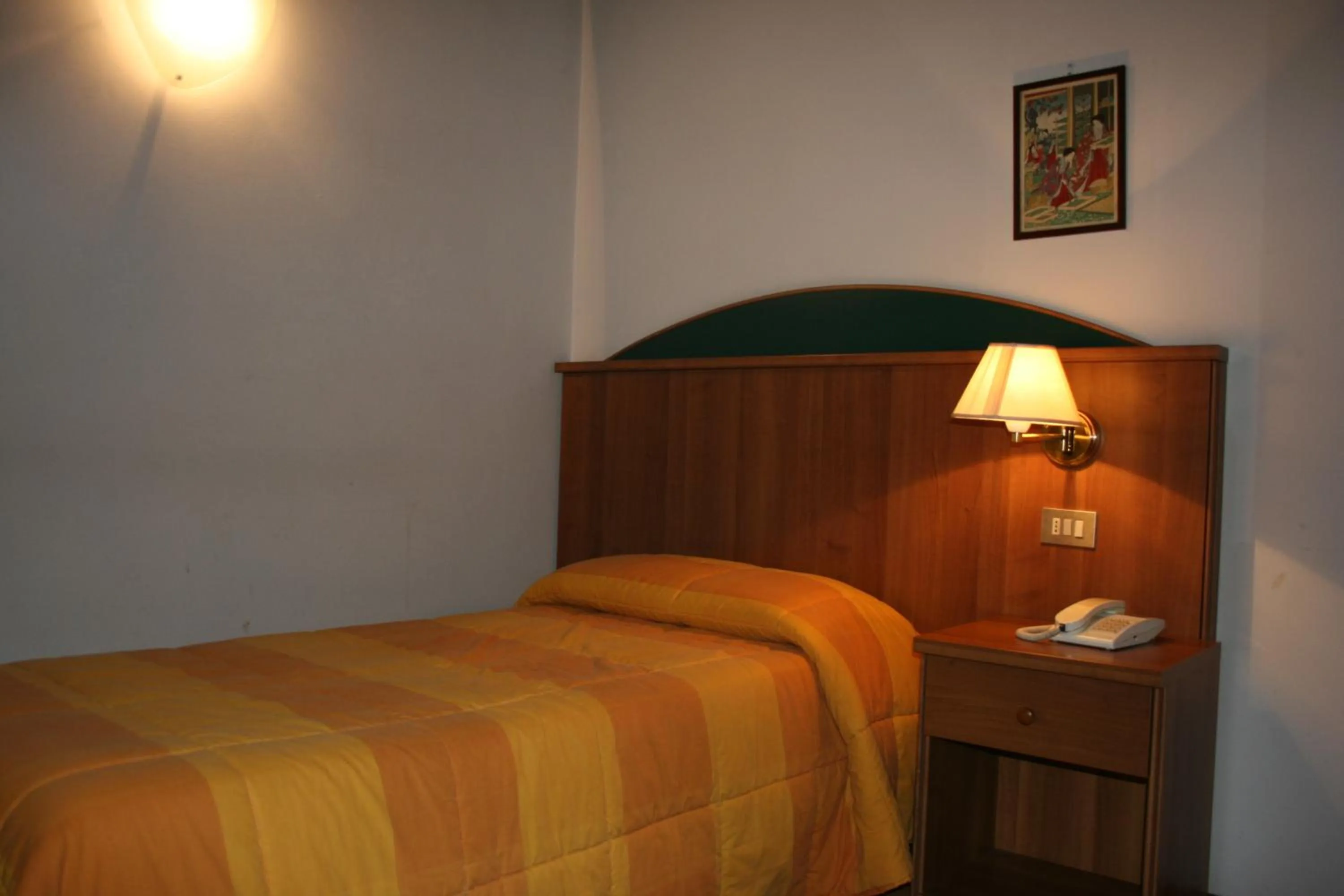 Bed in Locanda Stella D'oro