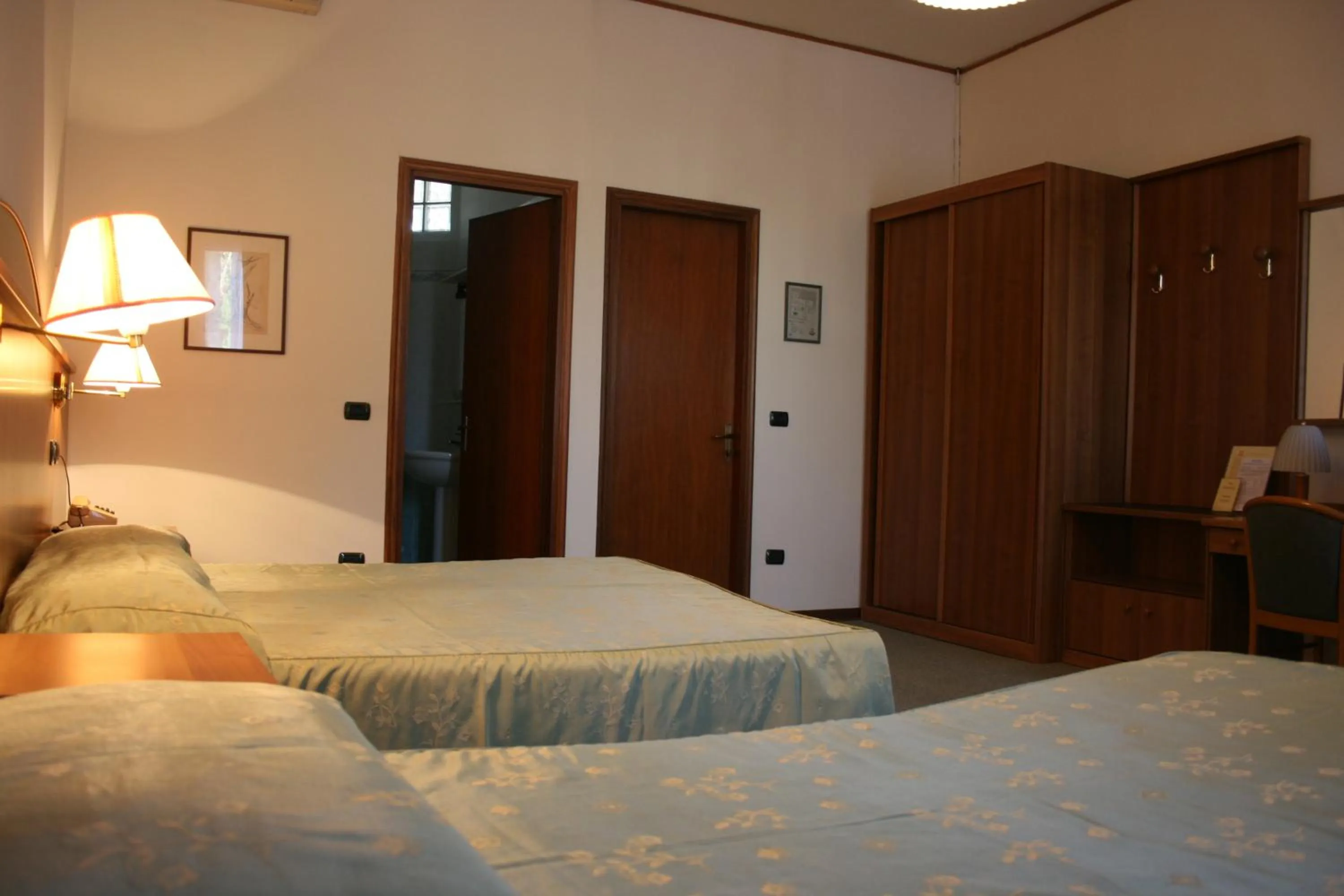 Bed in Locanda Stella D'oro