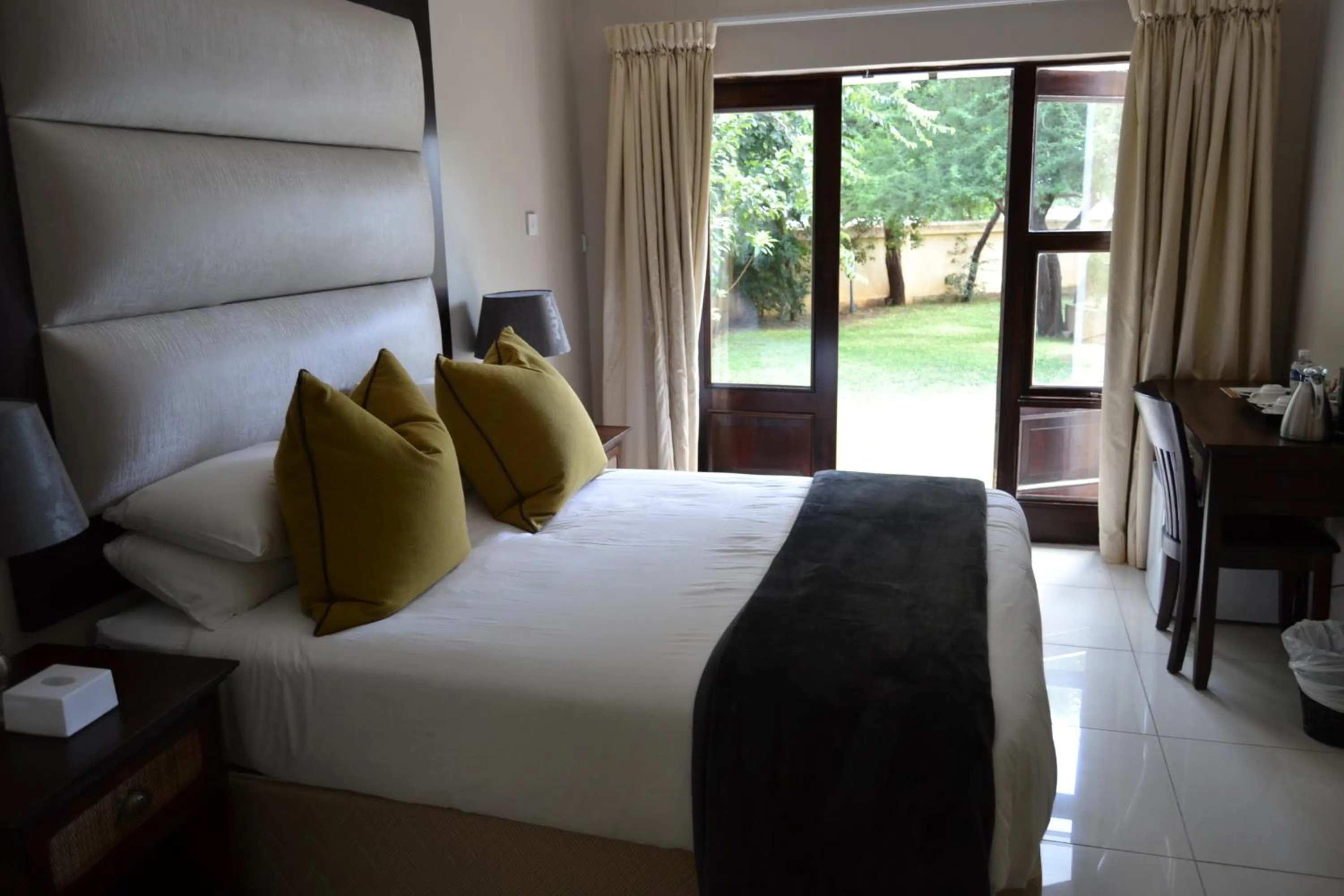 Day, Bed in The Capital Guest House