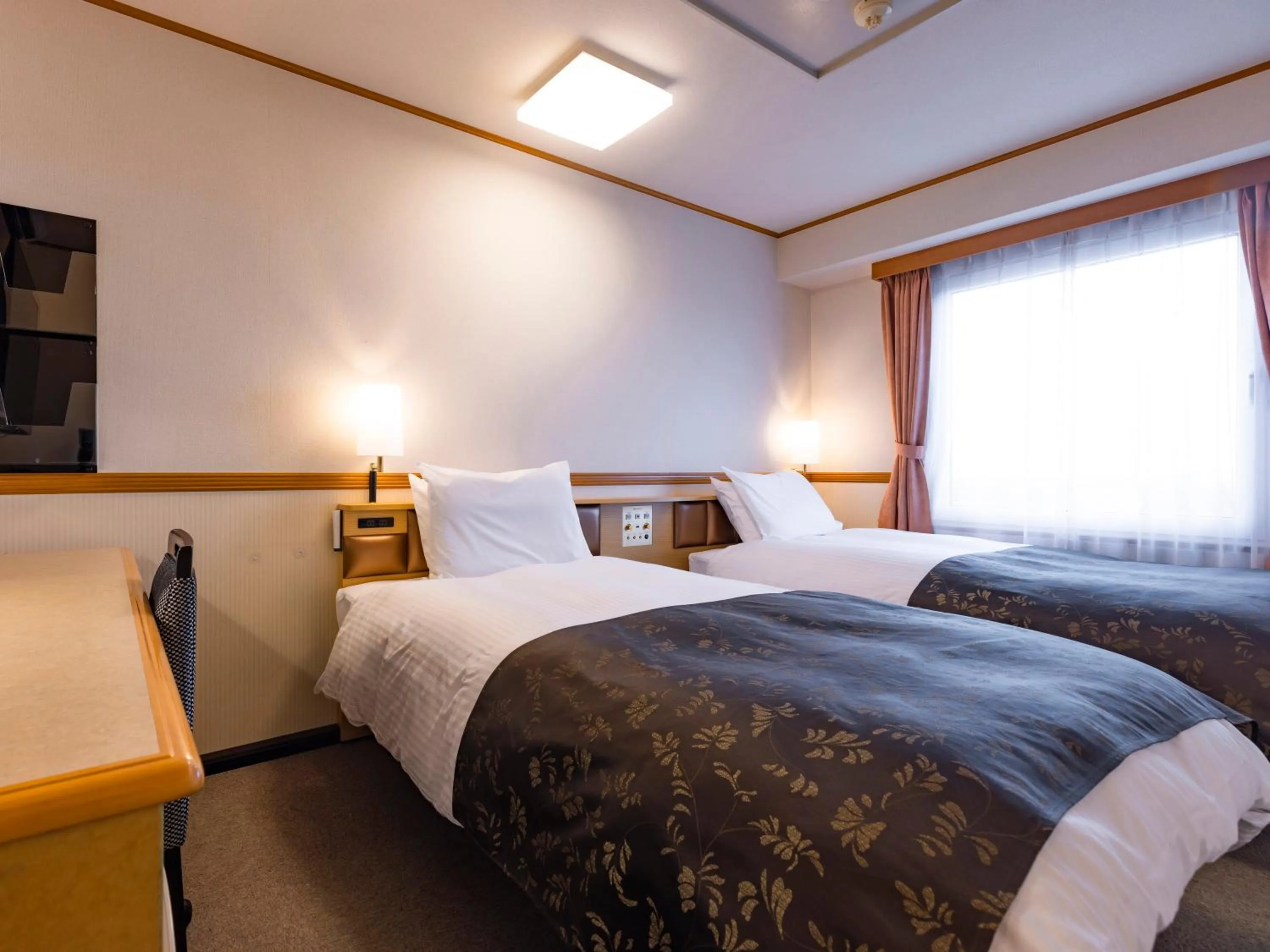 Photo of the whole room, Bed in APA Hotel Miyagi Furukawa Ekimae