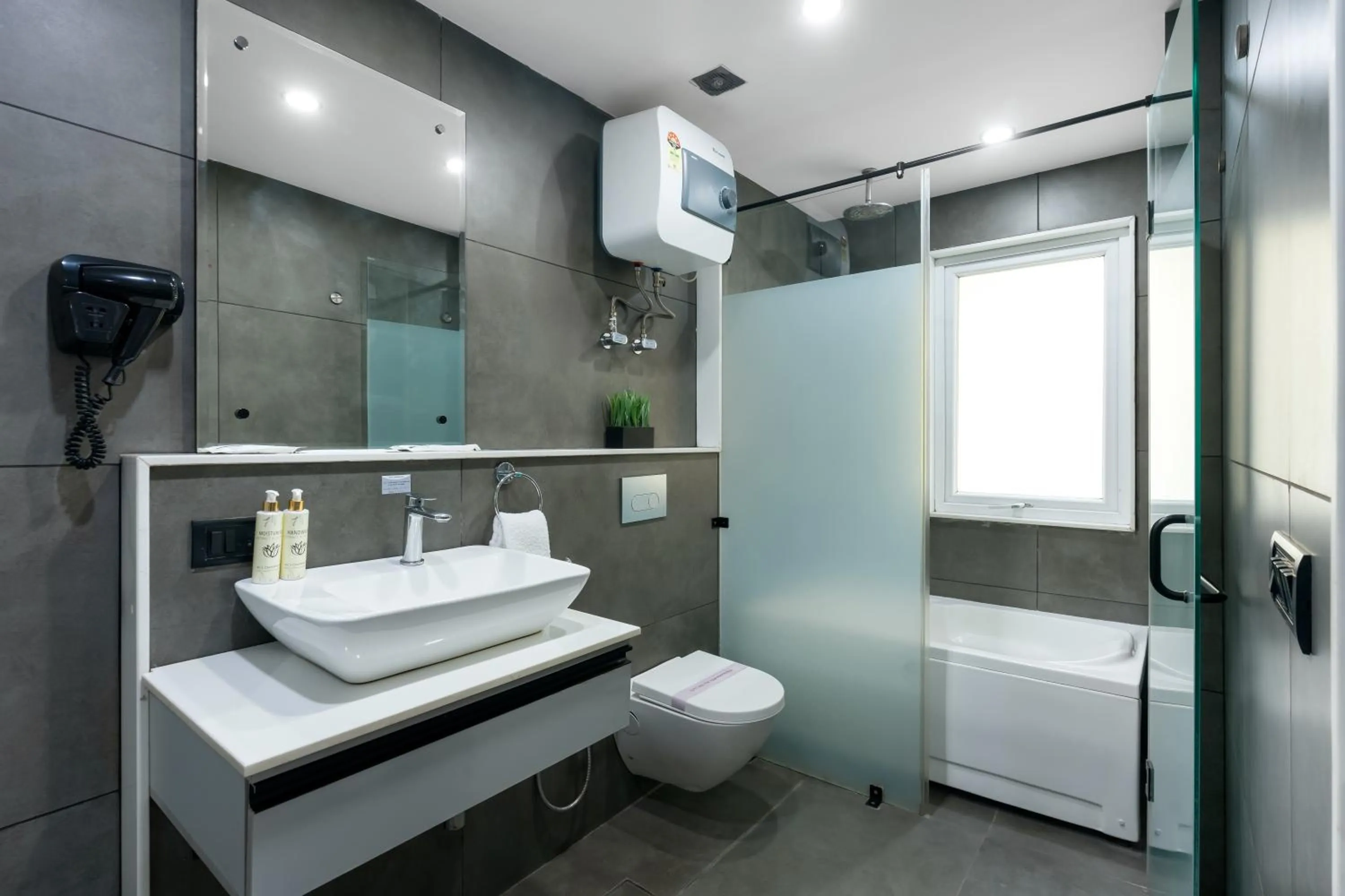 Shower in BedChambers Serviced Apartments, MG ROAD