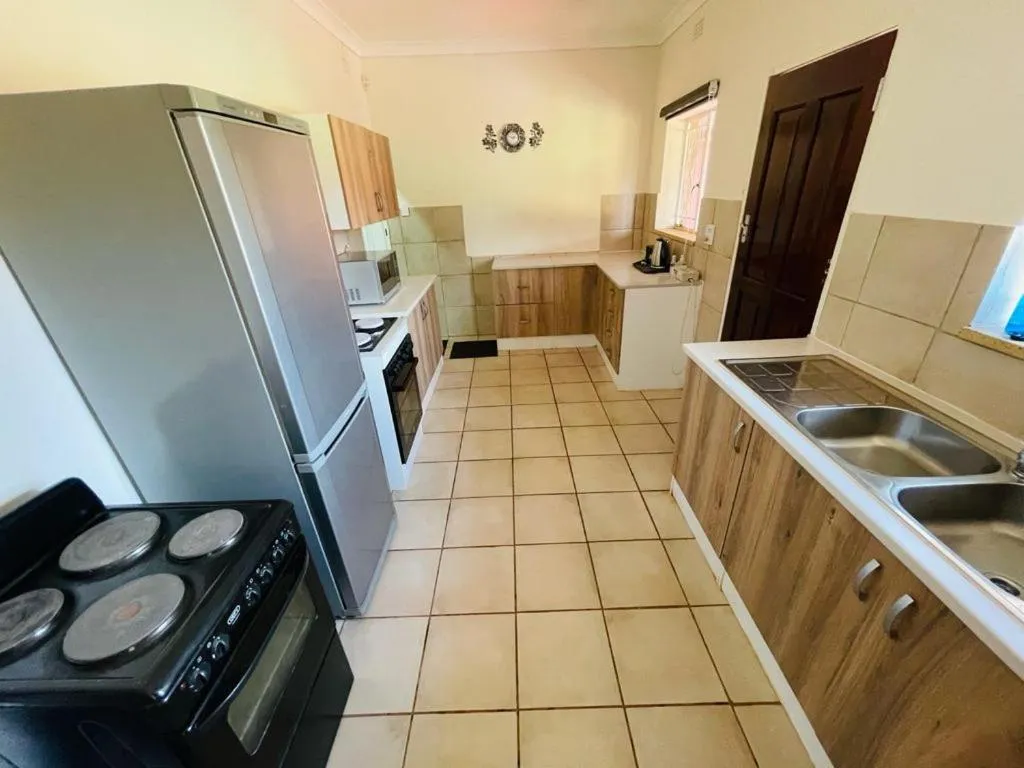 Kitchen or kitchenette in Ithonsi Guesthouse