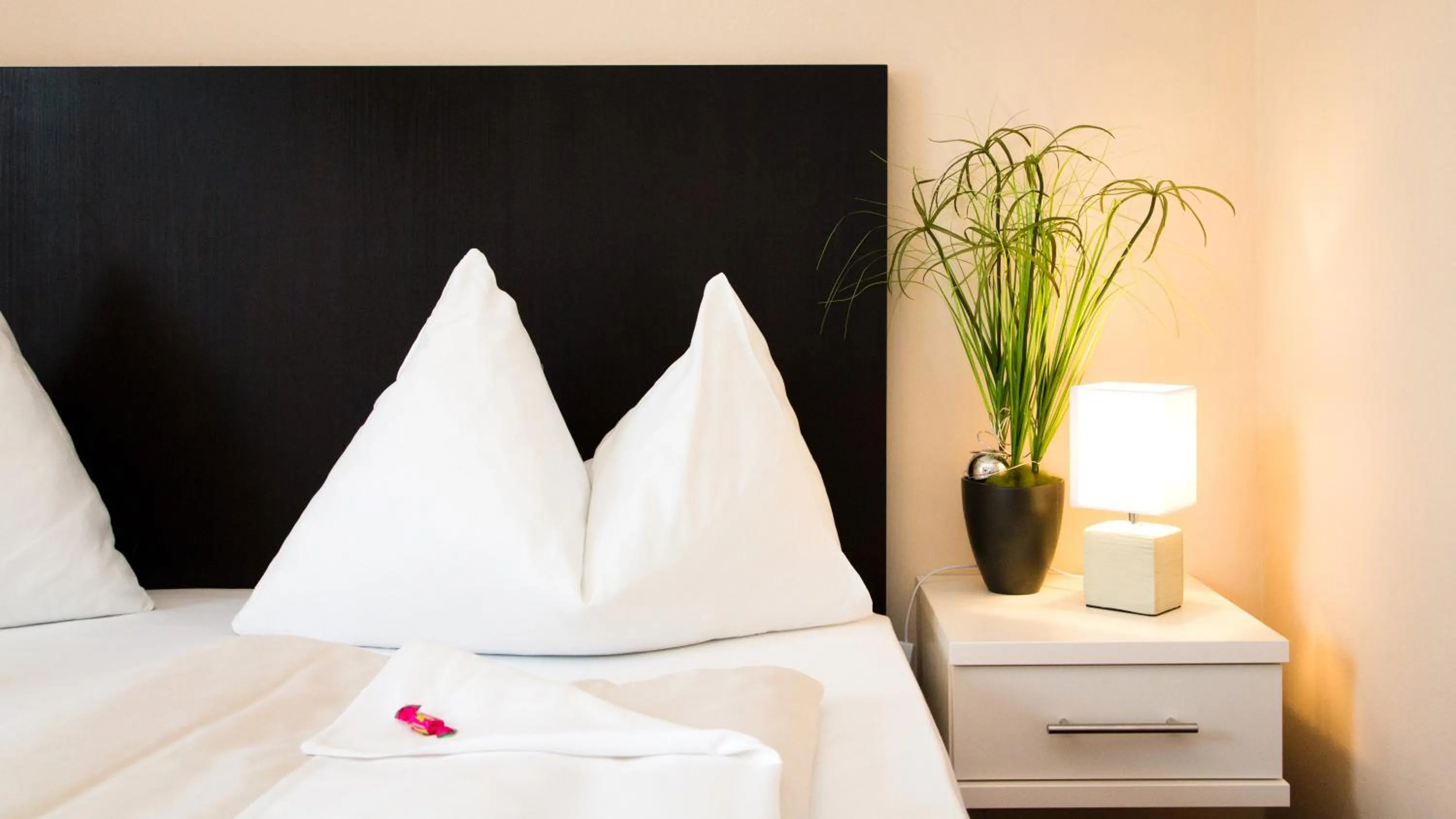 Bed in Stadthotel Kramer