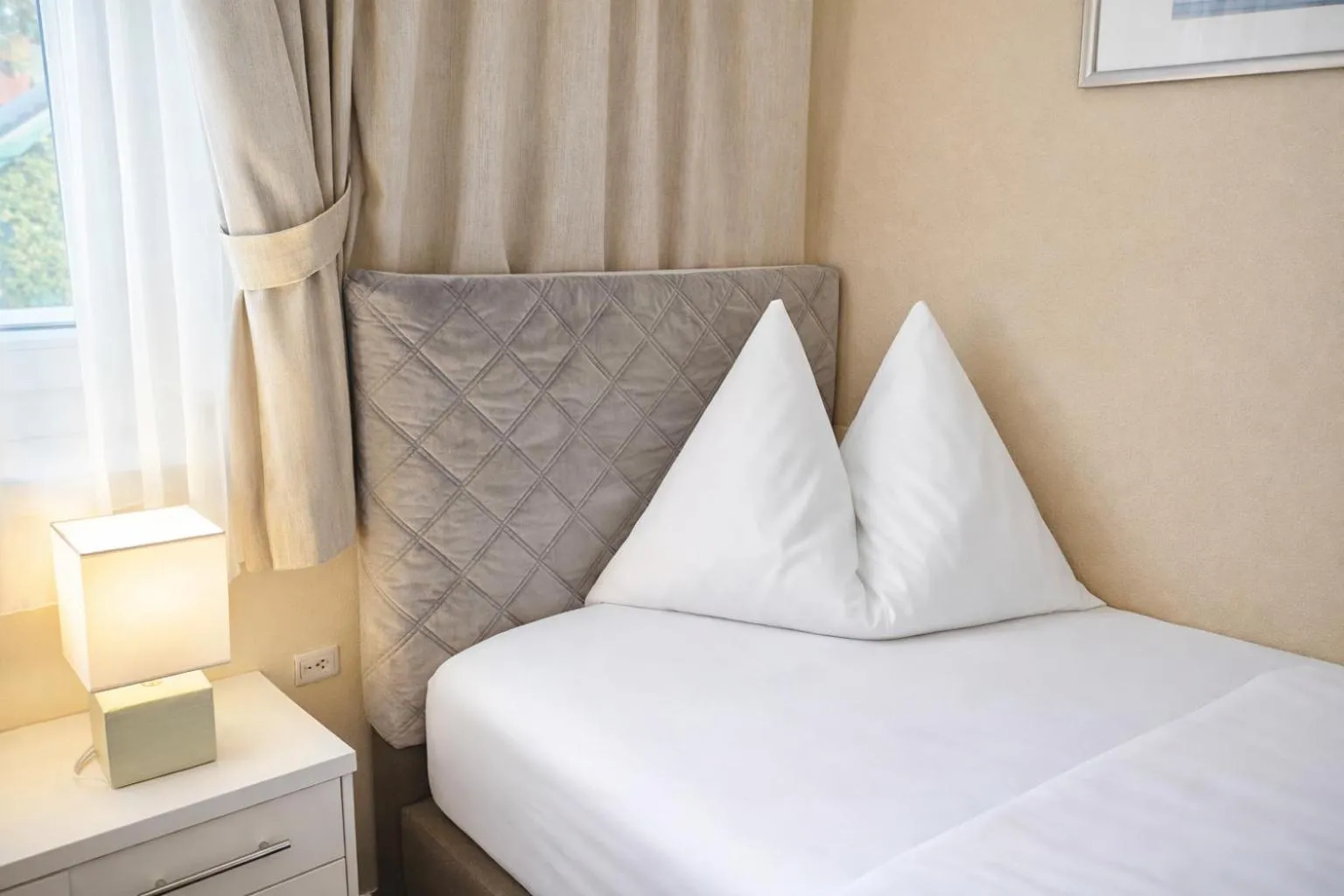 Bed in Stadthotel Kramer