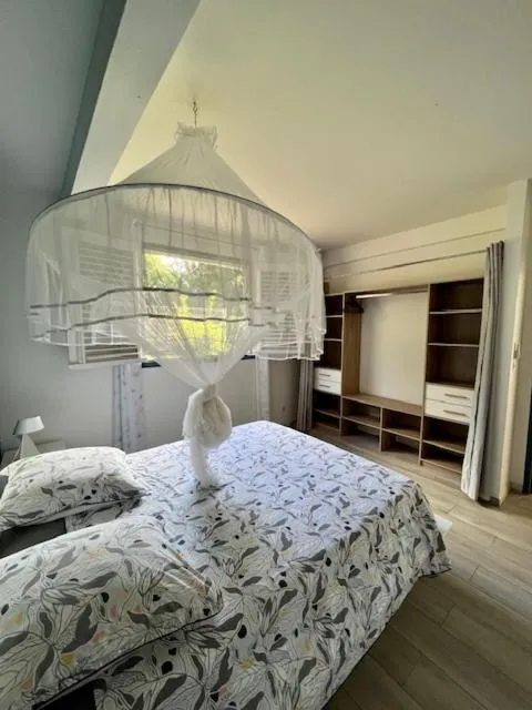 Bed in Villa Ti'Kemy avec piscine au sel