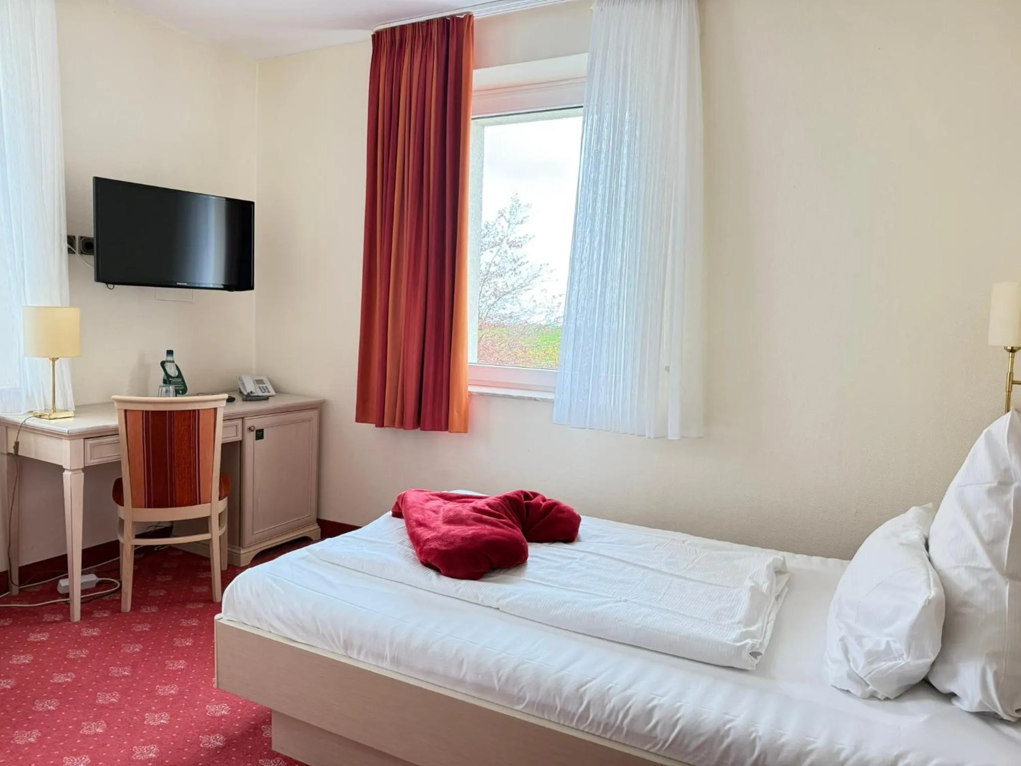 Photo of the whole room, Bed in Seehotel Neue Liebe