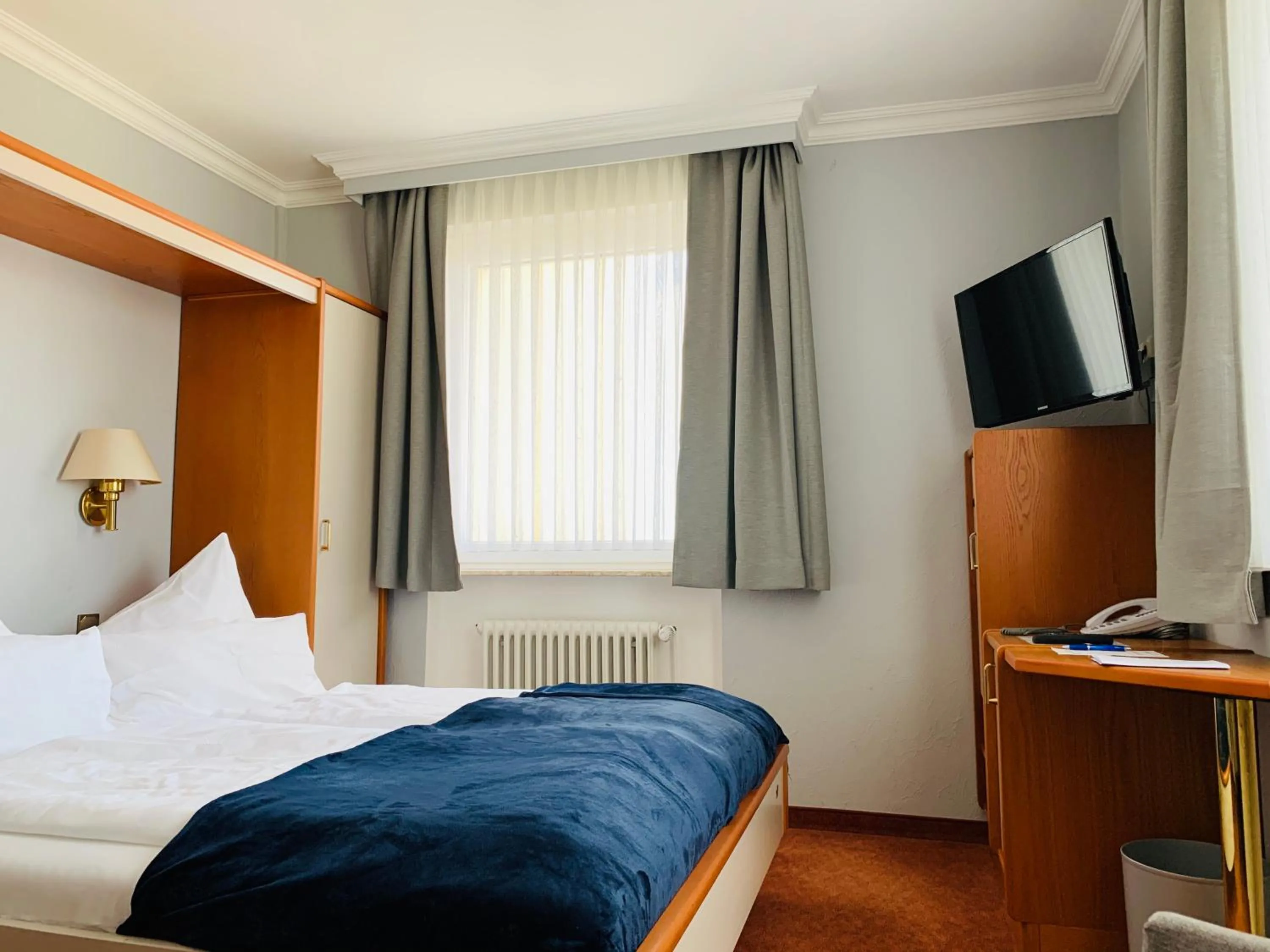Photo of the whole room, Bed in Seehotel Neue Liebe