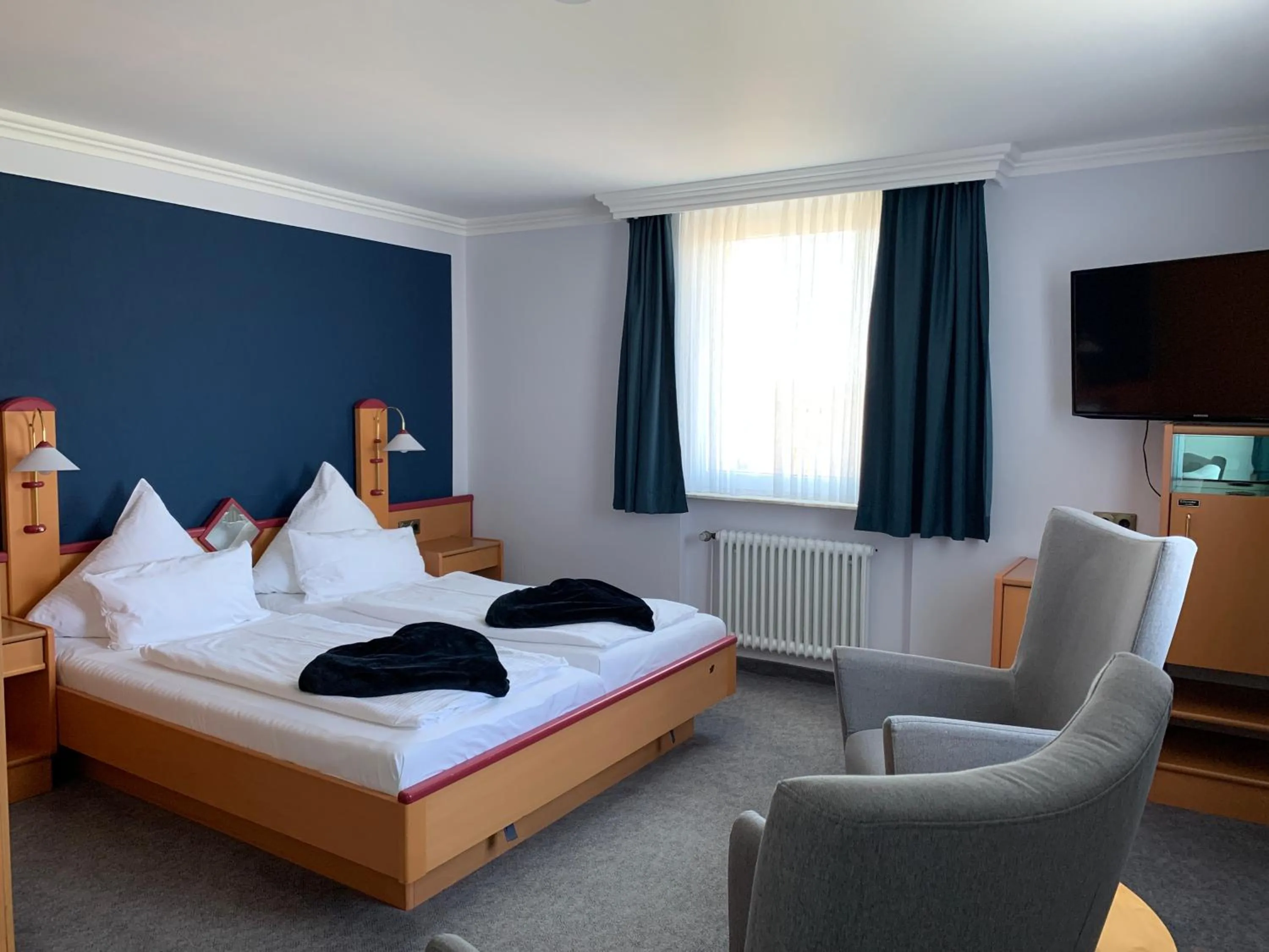 Photo of the whole room, Bed in Seehotel Neue Liebe