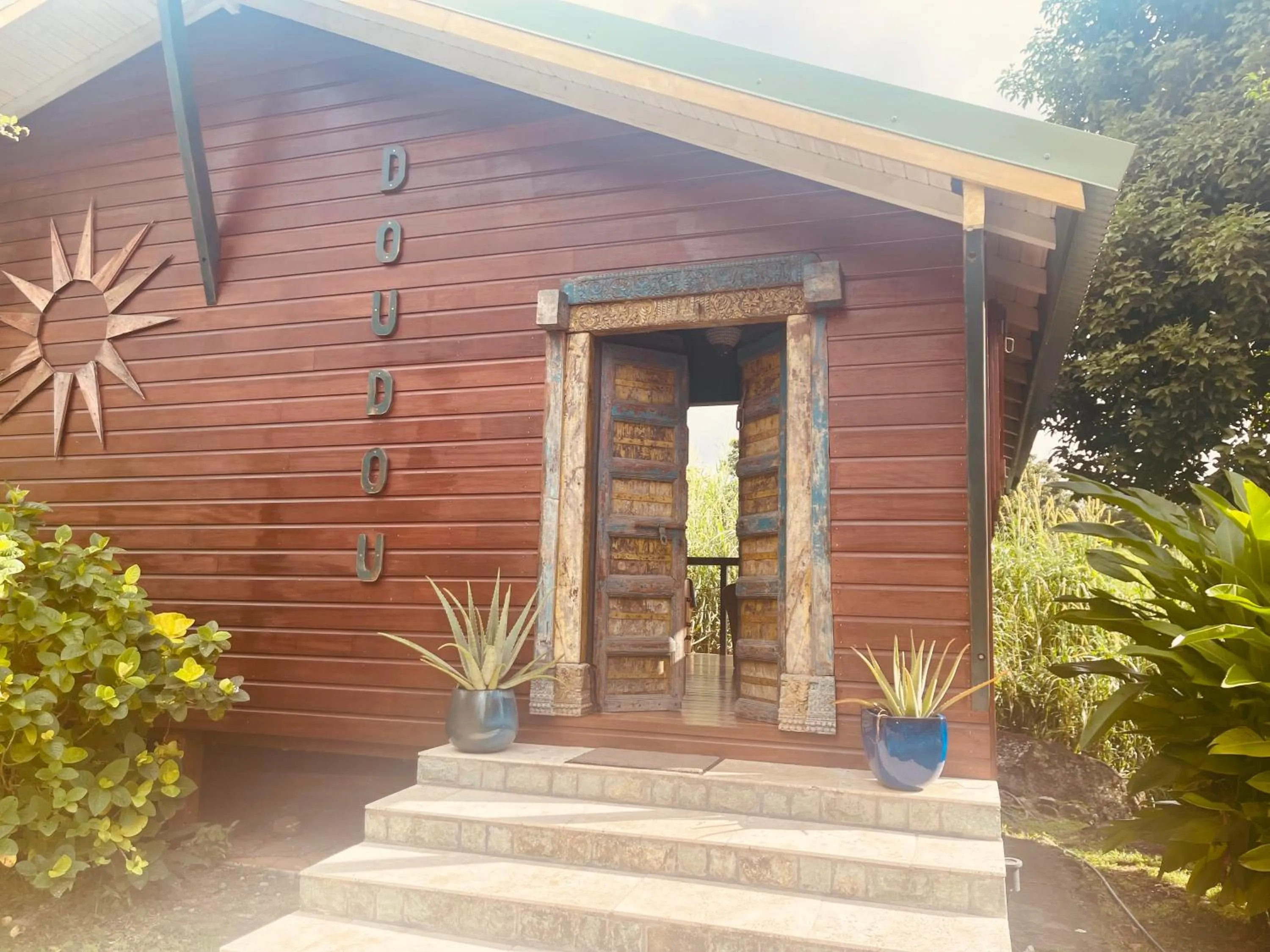 Facade/entrance in TropicAngel ECOLODGE de Charme