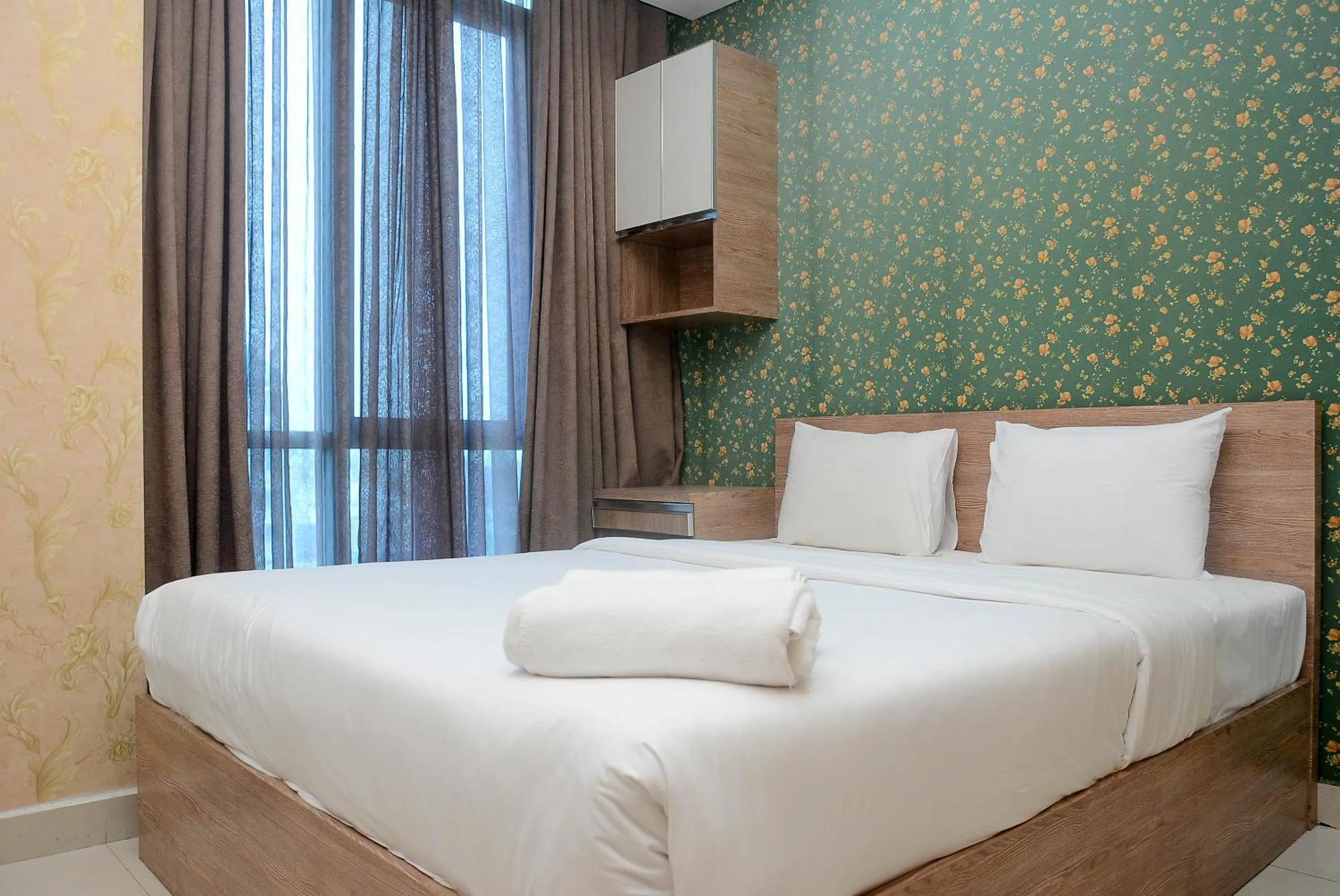 Bedroom, Bed in Gorgeous and Strategic Studio Apartment at Capitol Park Residence By Travelio