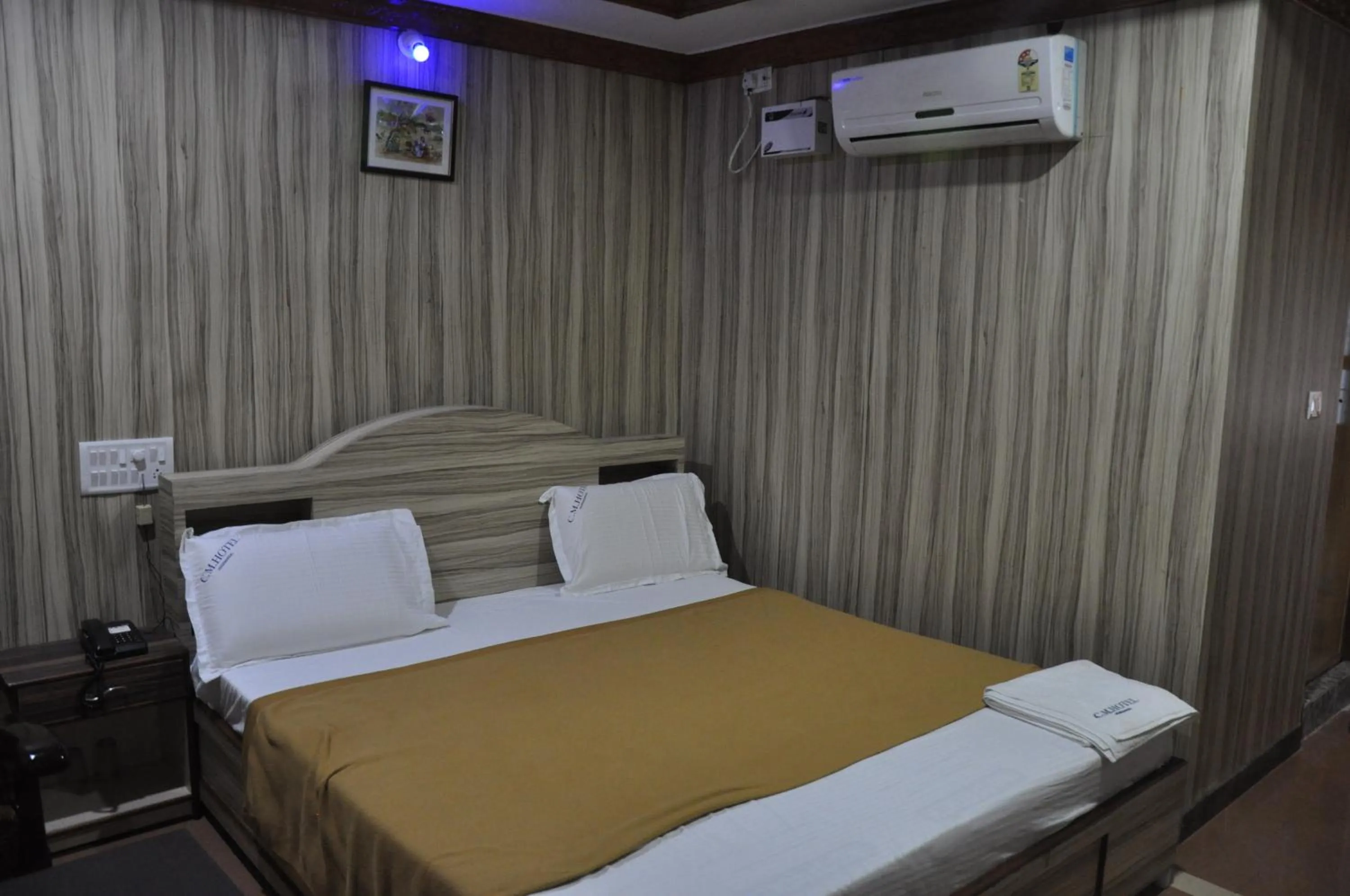 Bed in C M HOTEL NEW