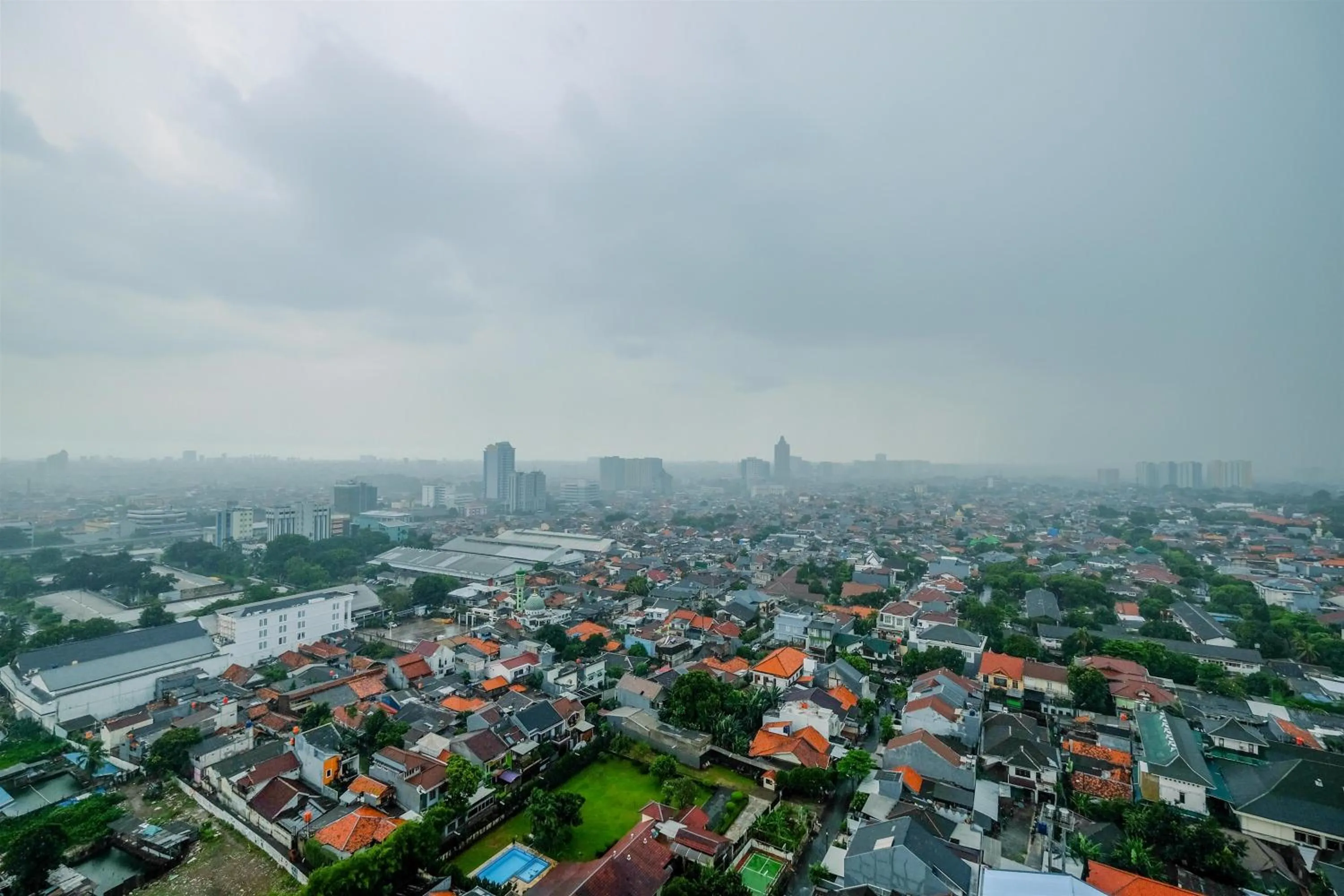 City view in Brand New 2BR L'Avenue Apartment By Travelio