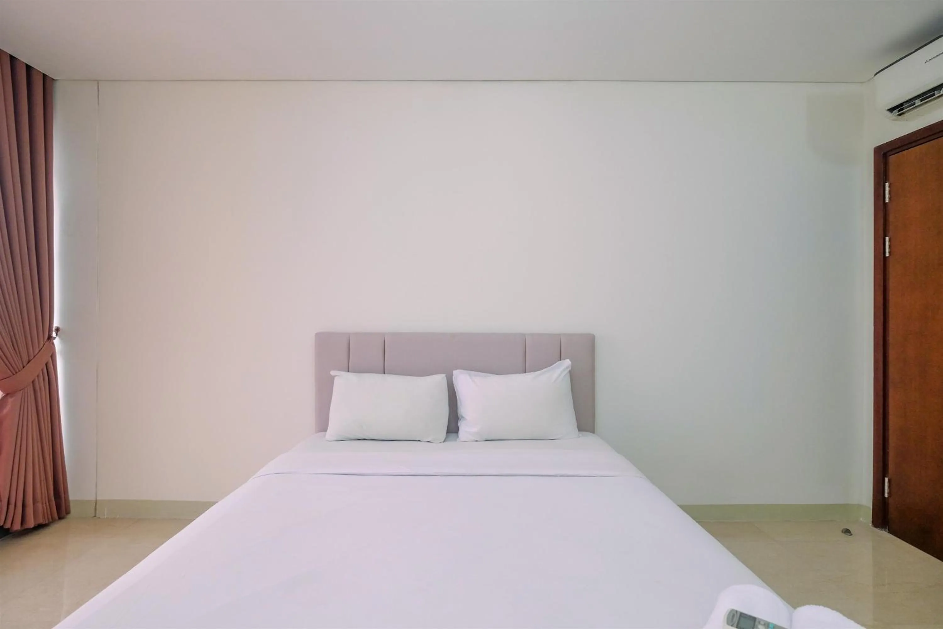 Bedroom in Brand New 2BR L'Avenue Apartment By Travelio