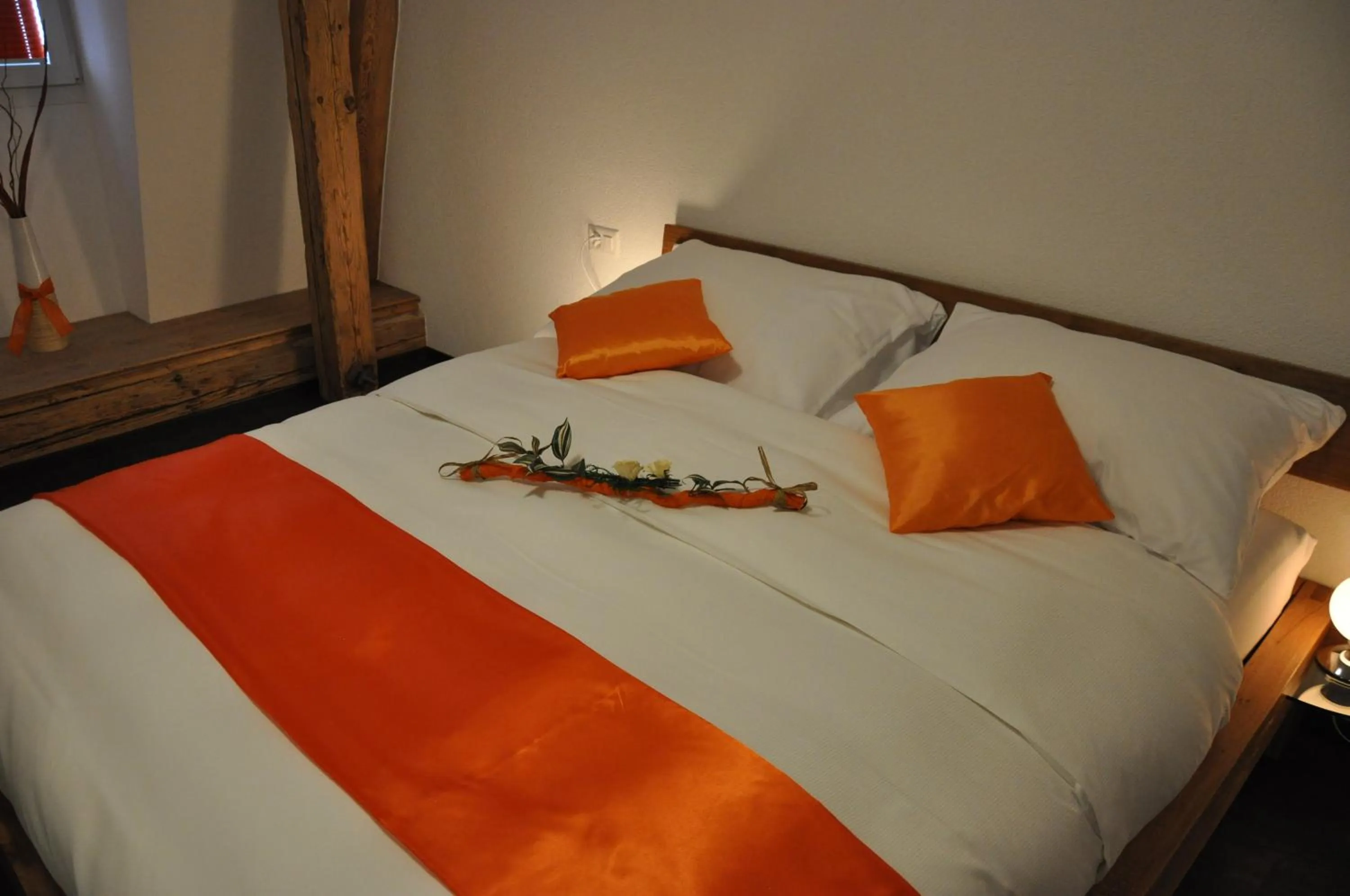 Bed in Le Relais du Château Monney