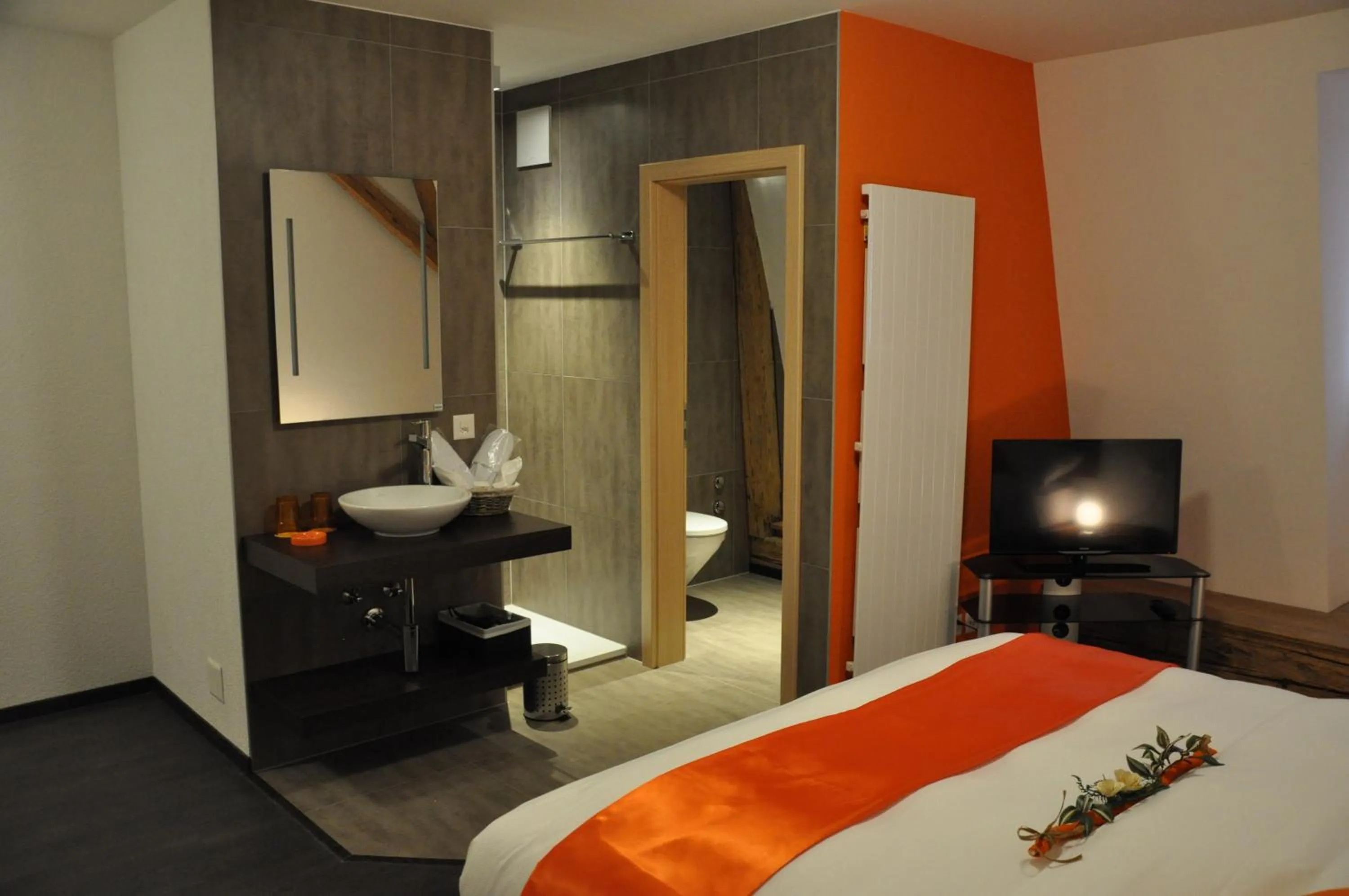 Bed in Le Relais du Château Monney