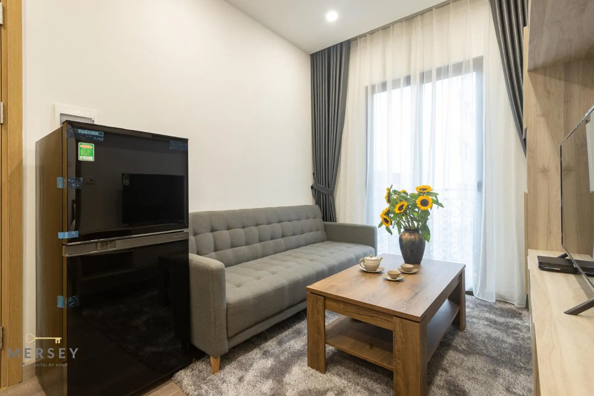 Living room in Mersey Central Hanoi Apart'Hotel