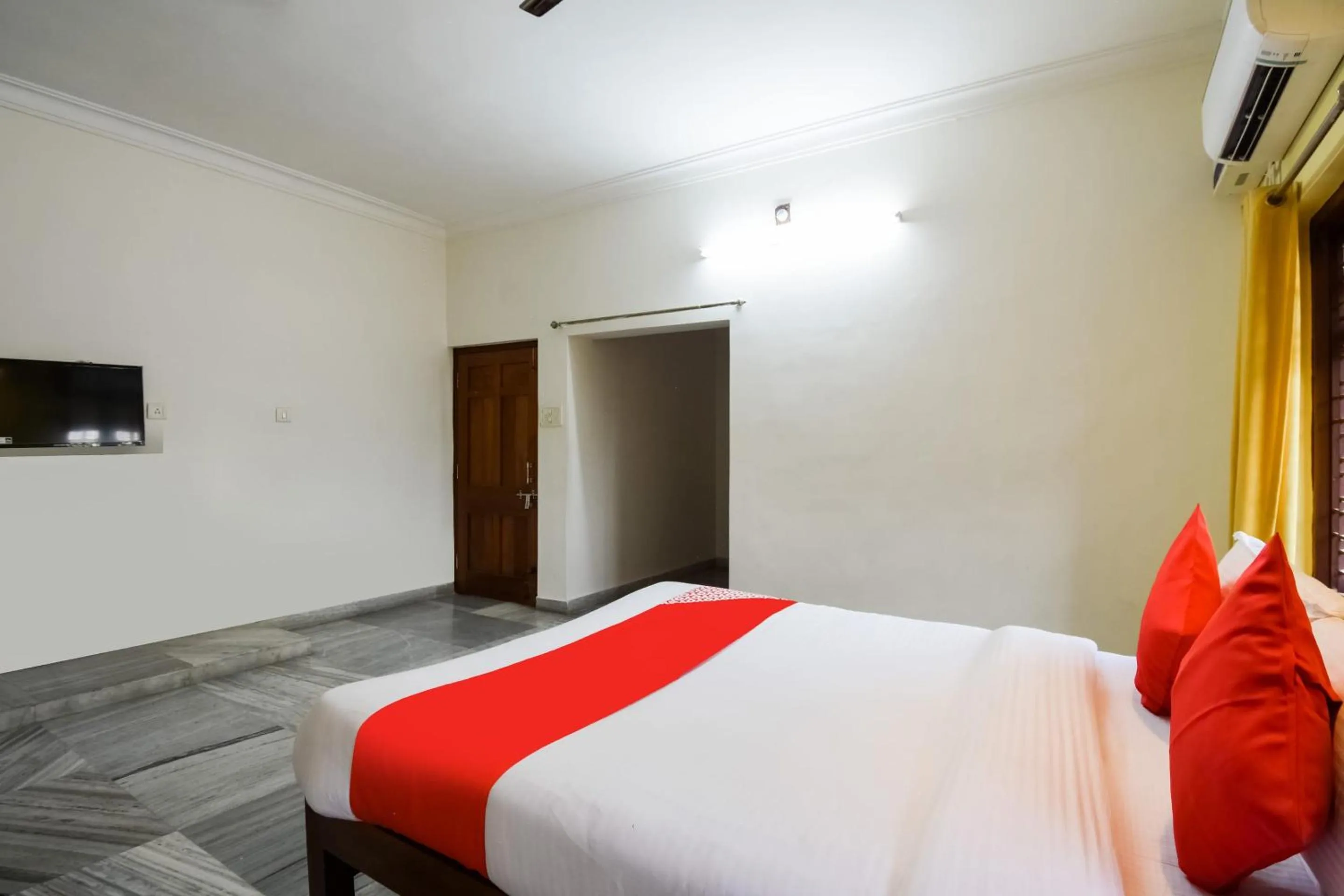 Bedroom in Hotel O Mks Inn