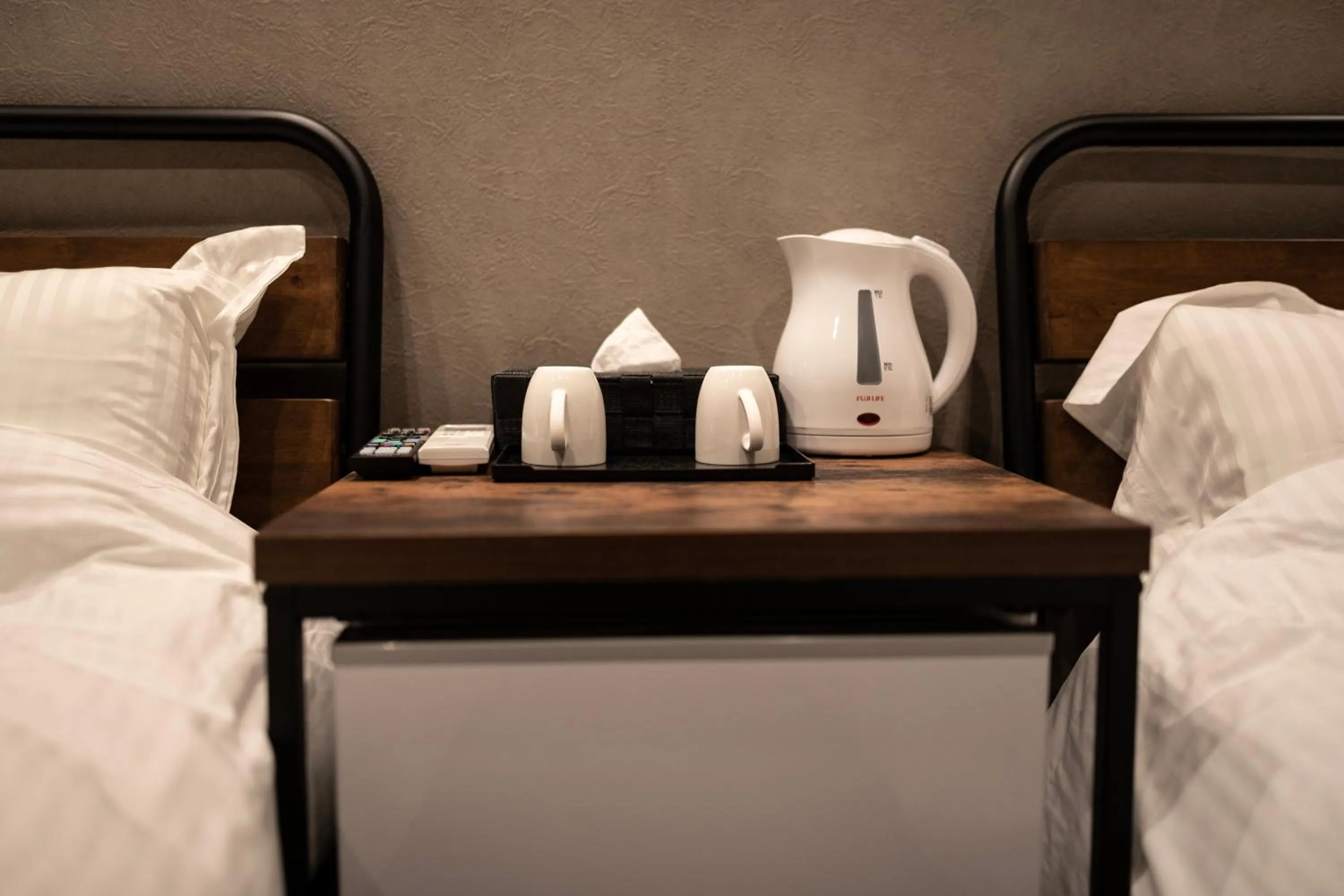 Coffee/tea facilities, Bed in リゾートイン西表島