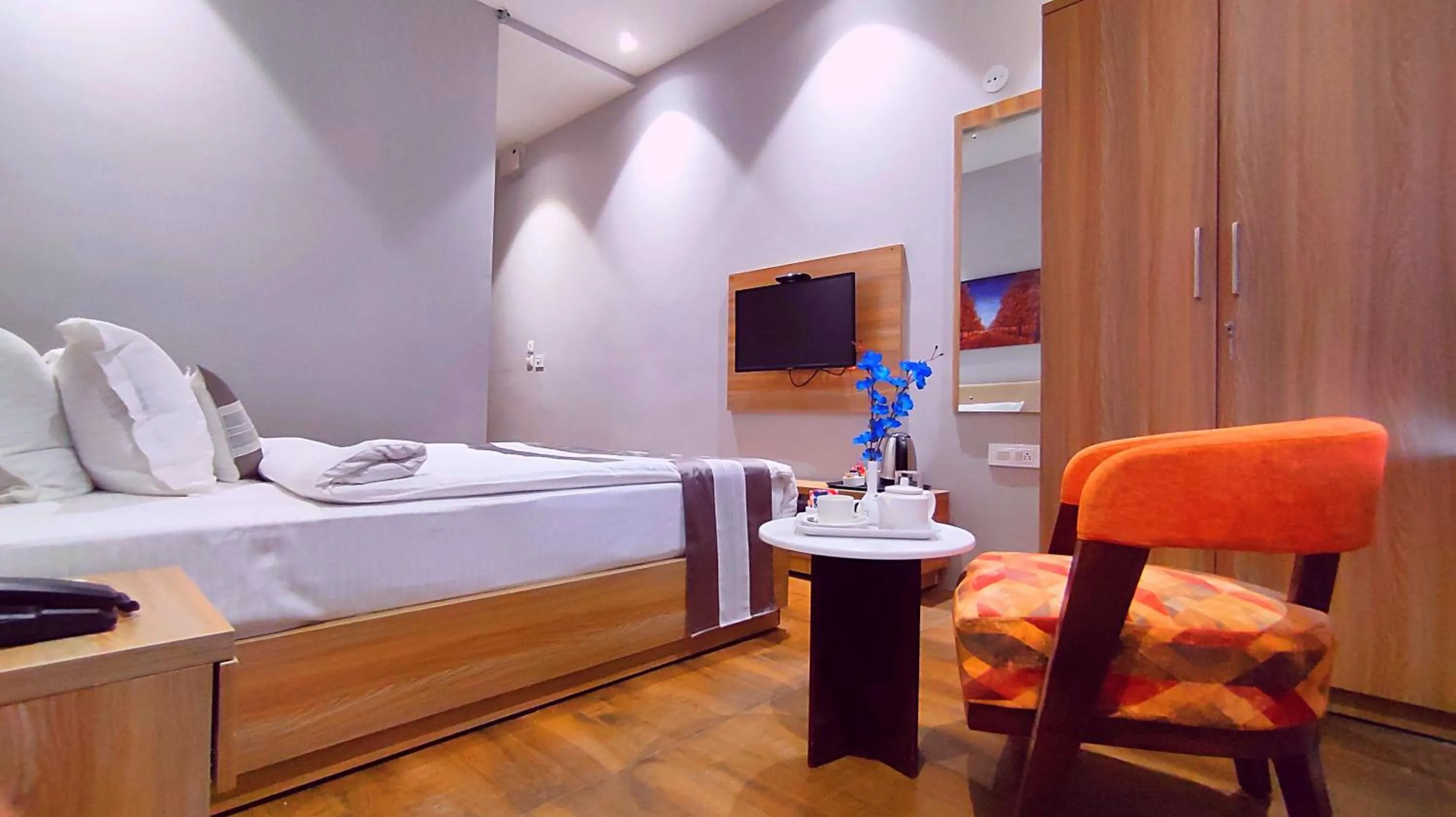 Bed in ShriGo Hotel Nathdwara