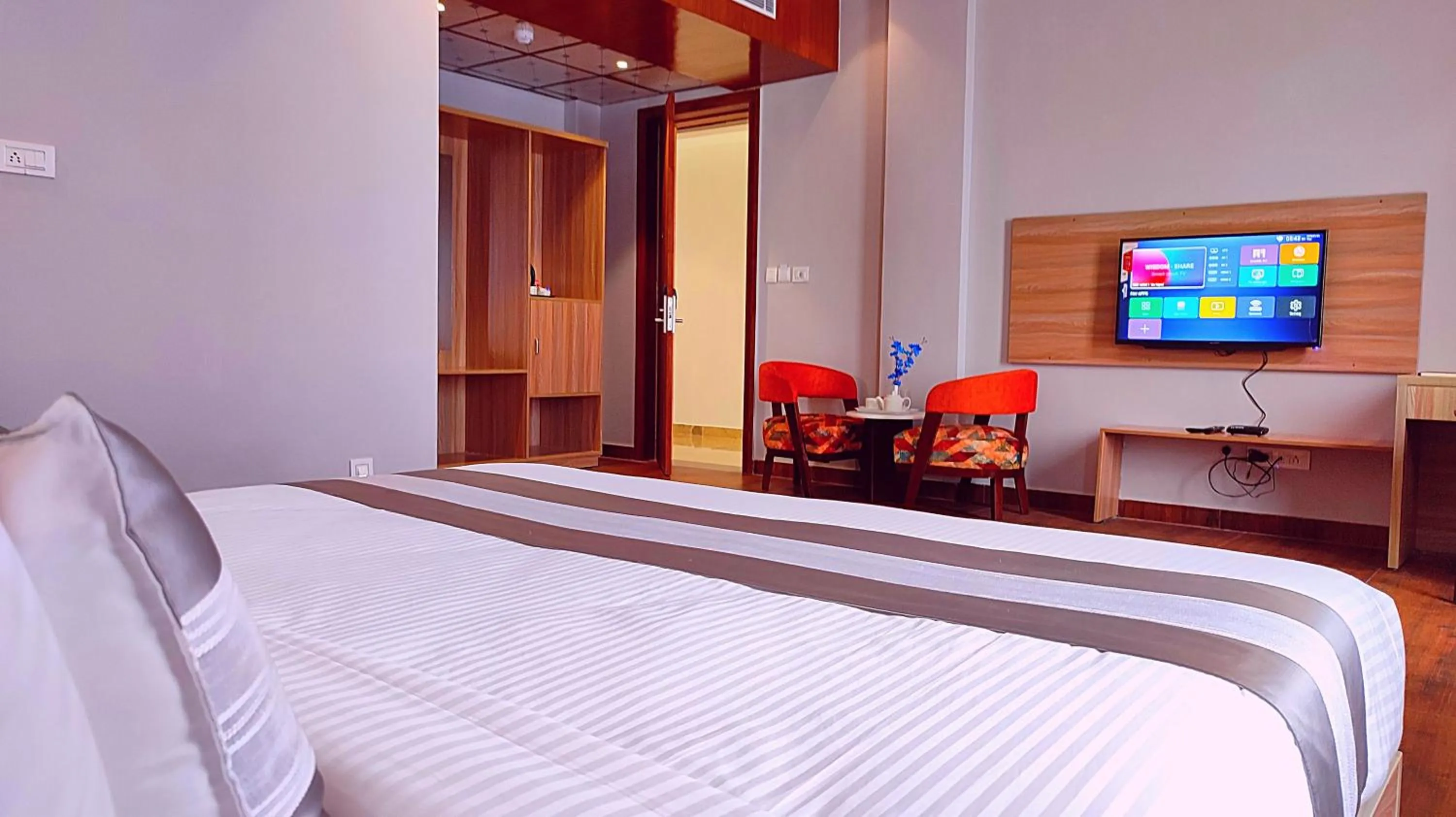 Photo of the whole room, Bed in ShriGo Hotel Nathdwara