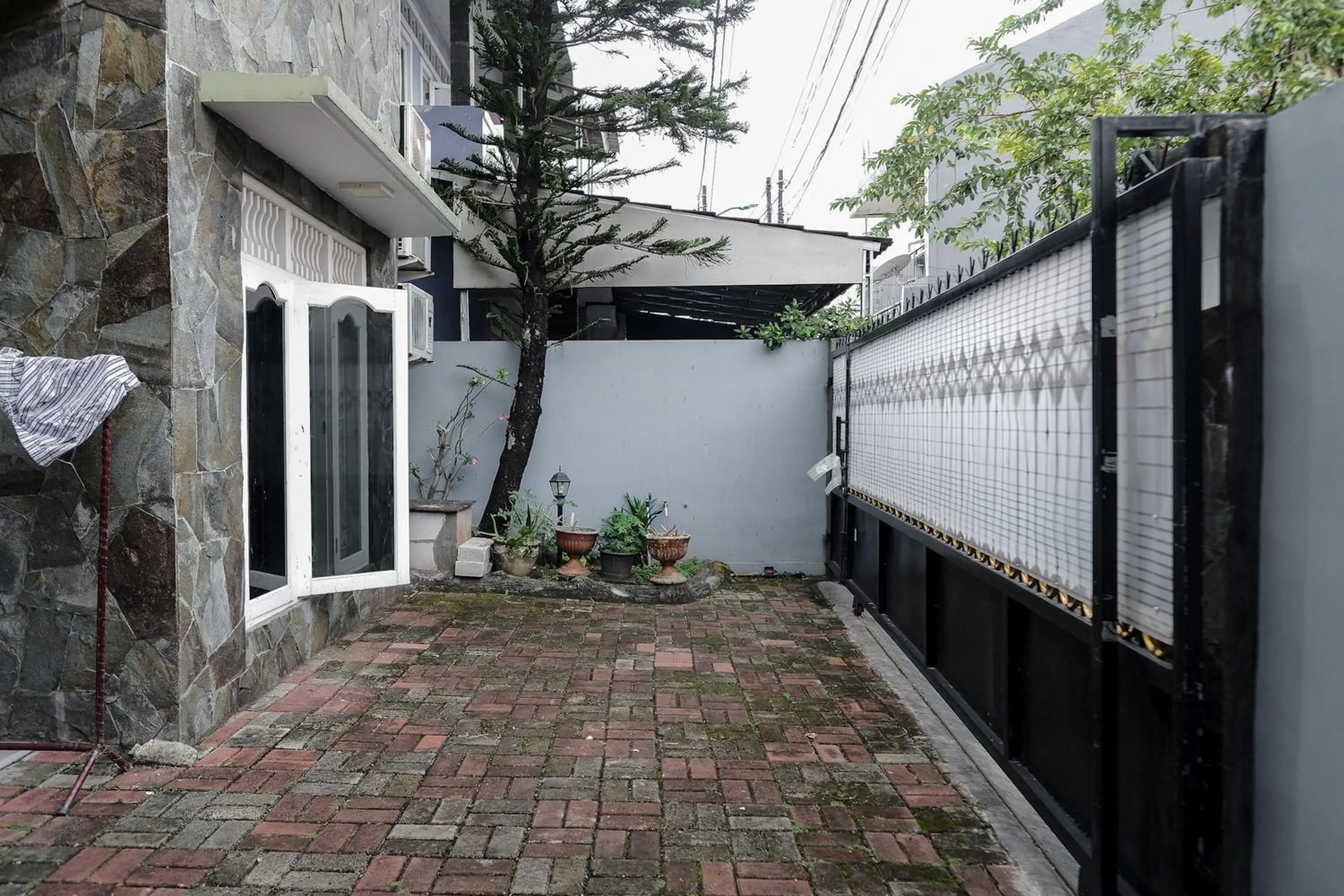 Property building in KoolKost Syariah near Green Pramuka Square Mall - Minimal Stay 6 Nights