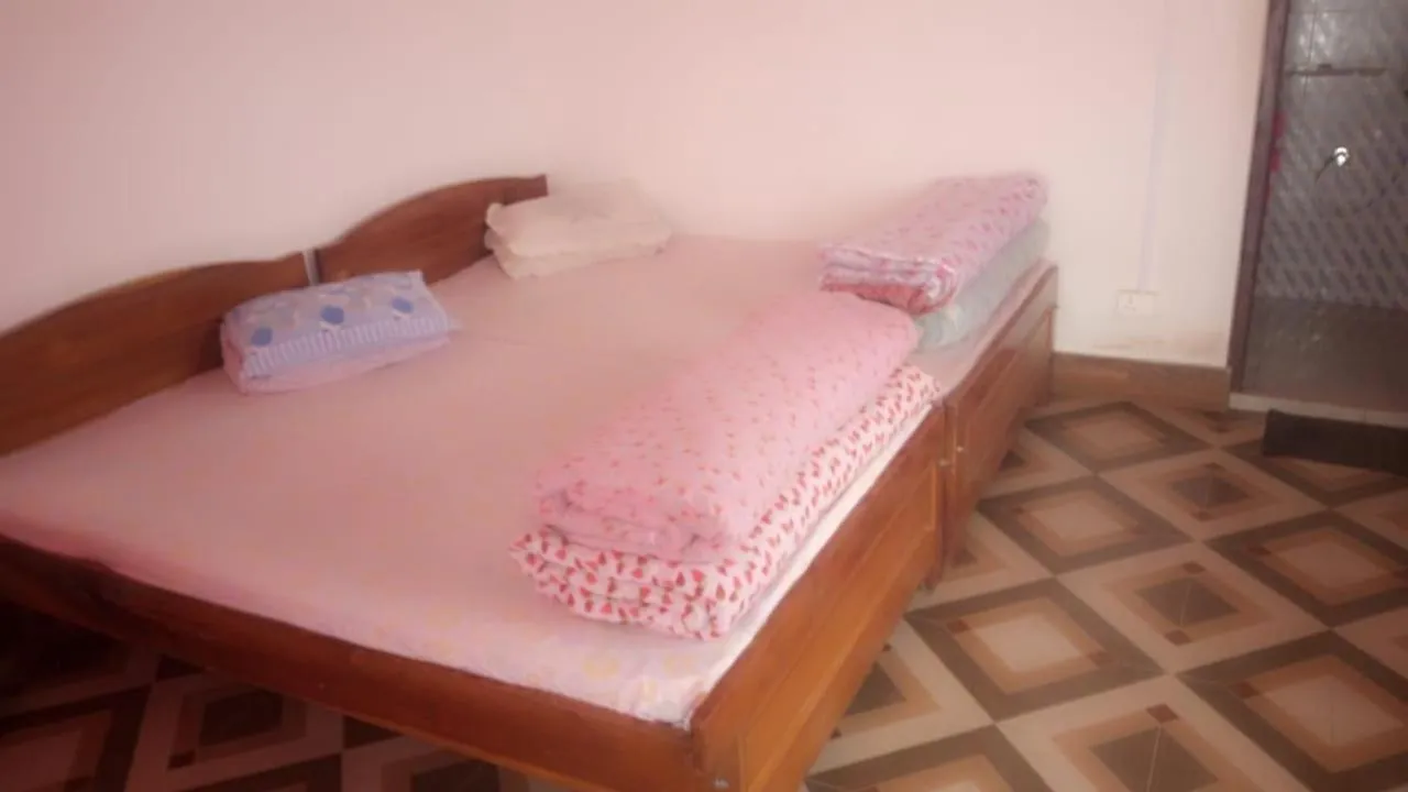 Bed in Dikis Homestay