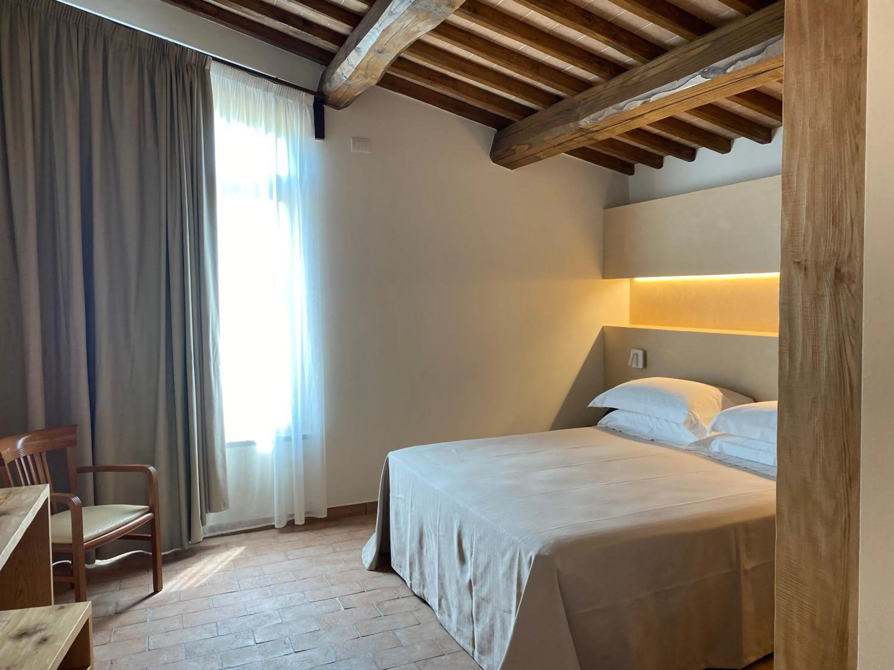 Photo of the whole room, Bed in Tenuta Sovestro - Agriturismo e winery