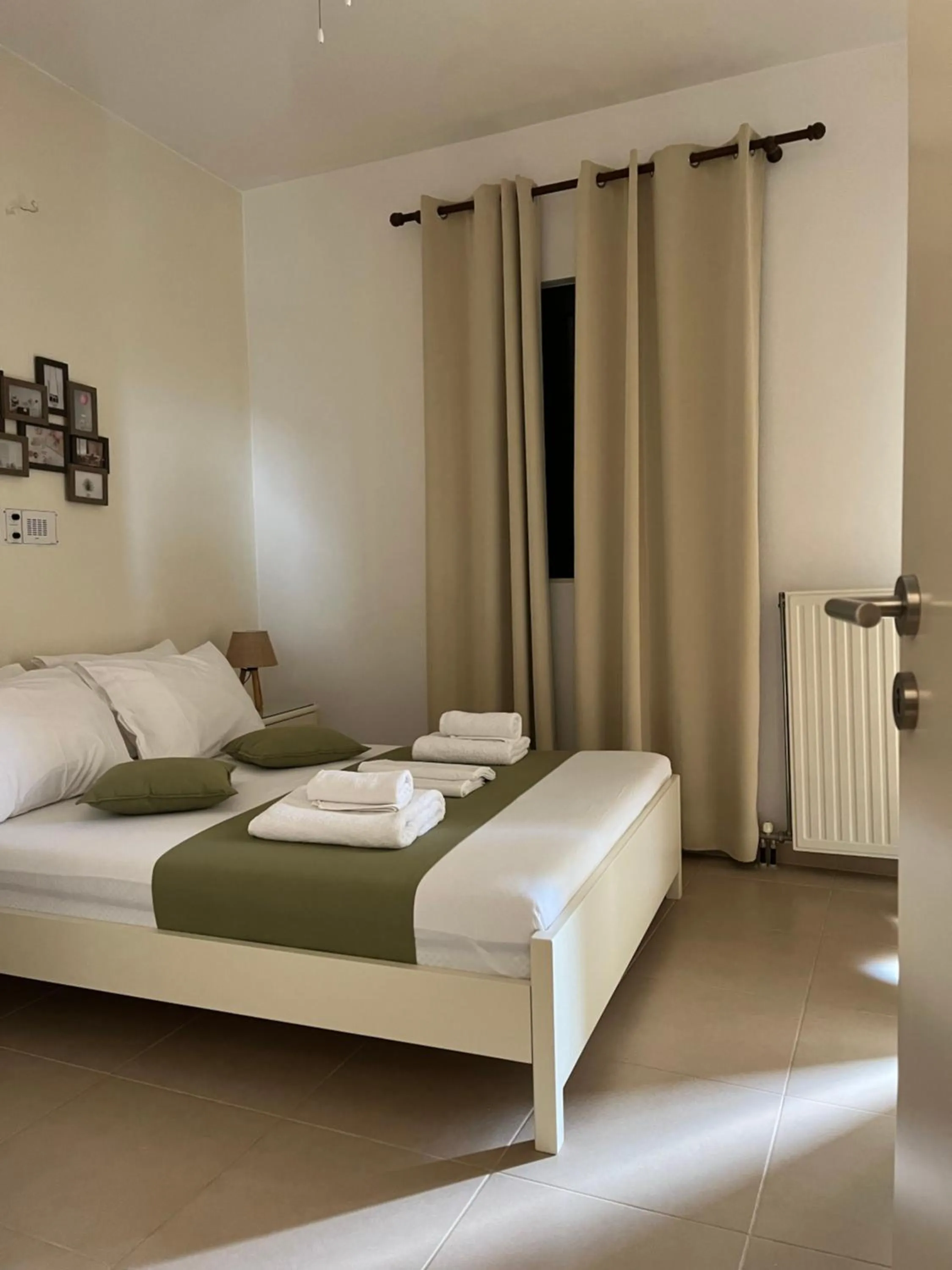 Bed in Myrthe Apartments