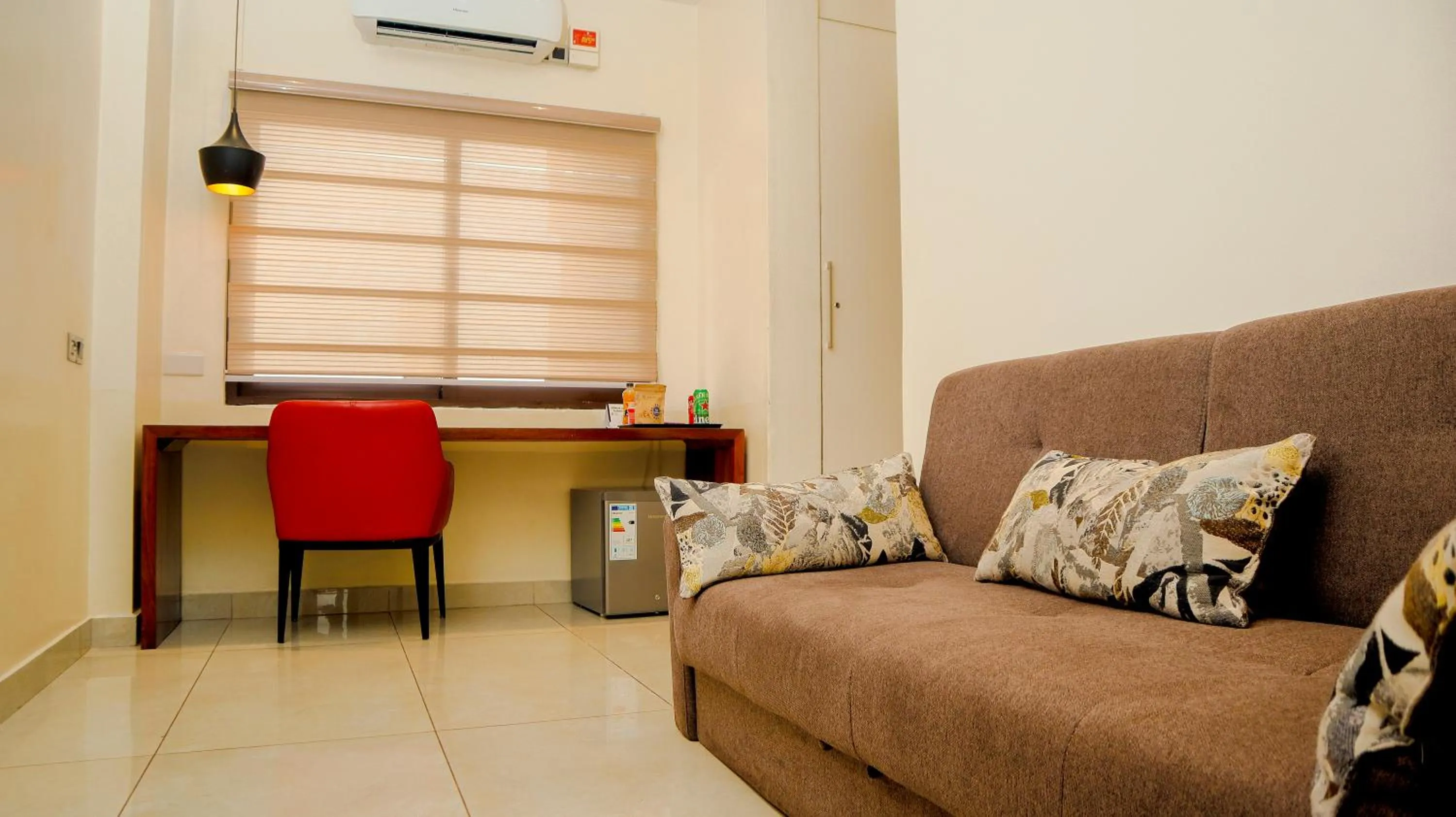 Living room in Millennium Terrace Hotel