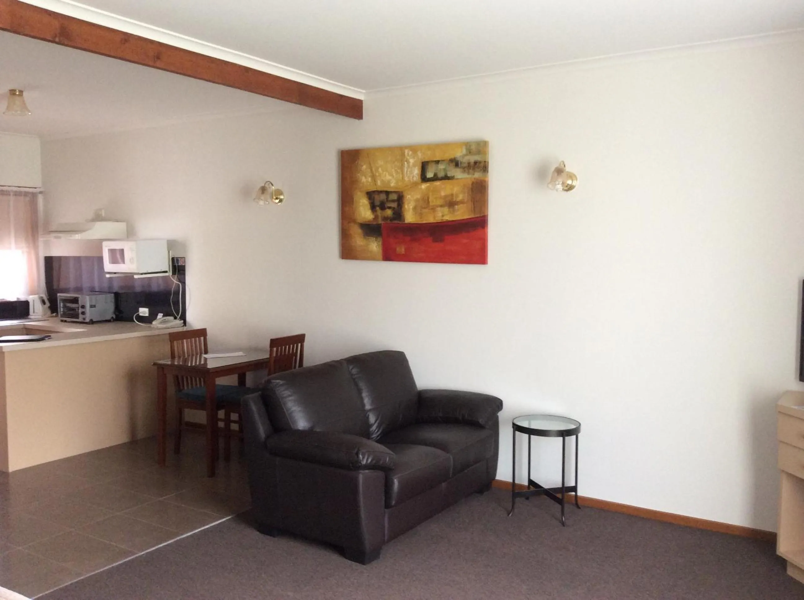 Living room in Ambassador Motor Inn