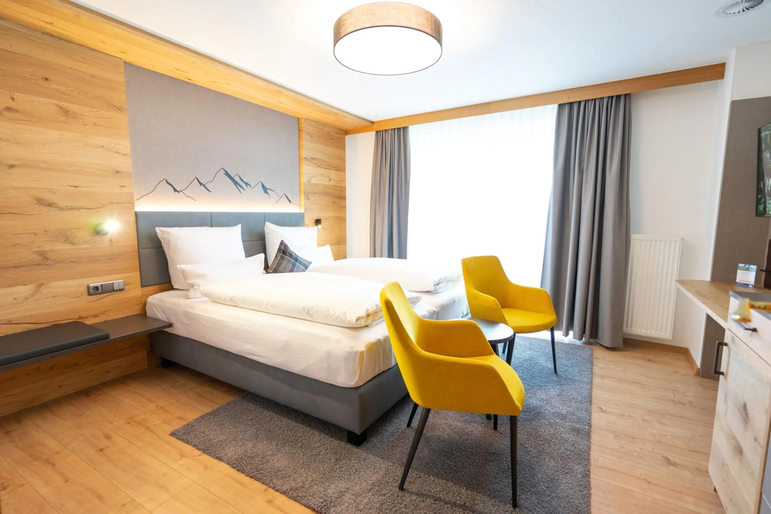 Bedroom, Bed in Alpenhof Oberstdorf Hotel & SPA, Signature Collection by BW