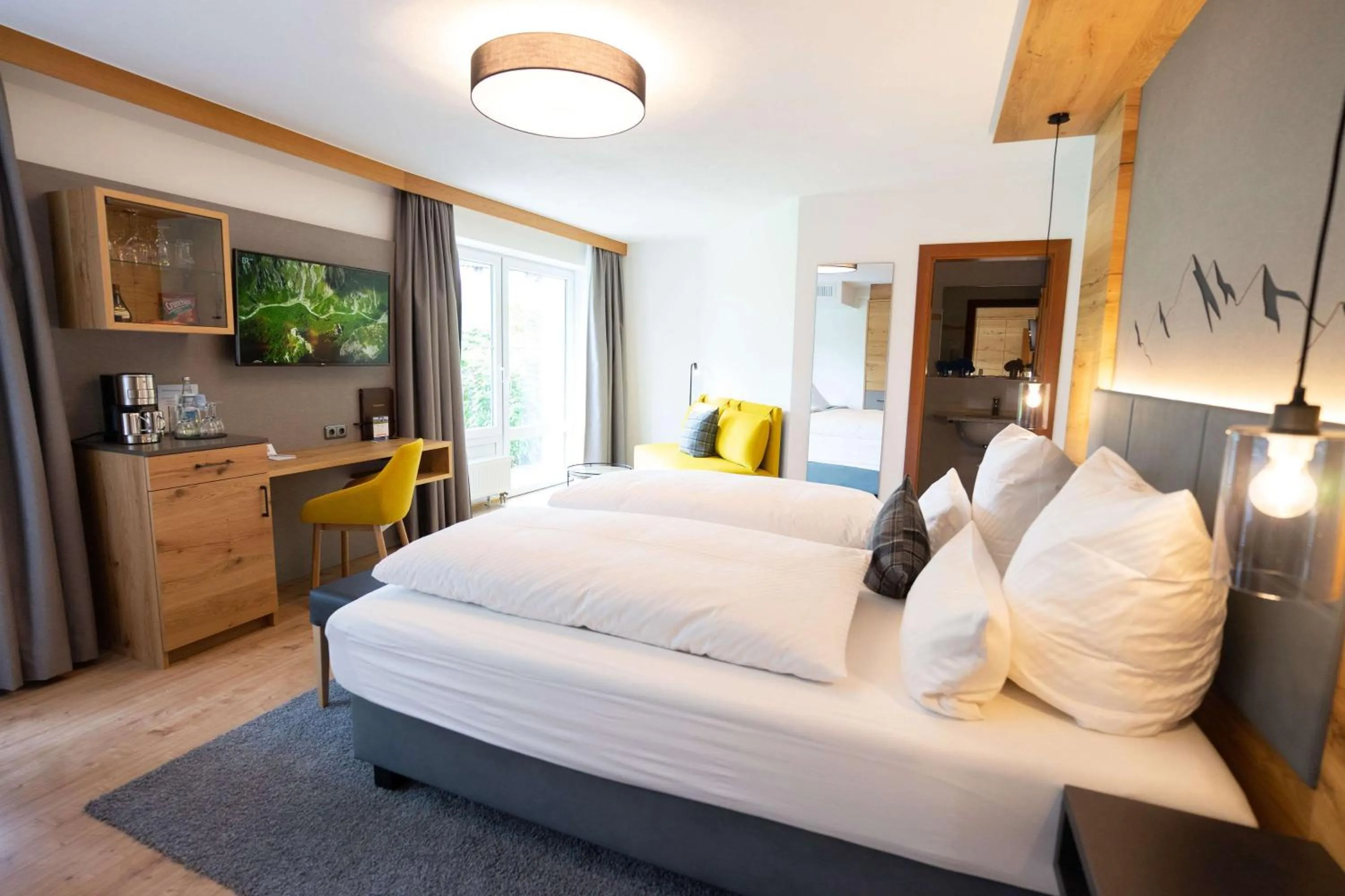 Bedroom, Bed in Alpenhof Oberstdorf Hotel & SPA, Signature Collection by BW