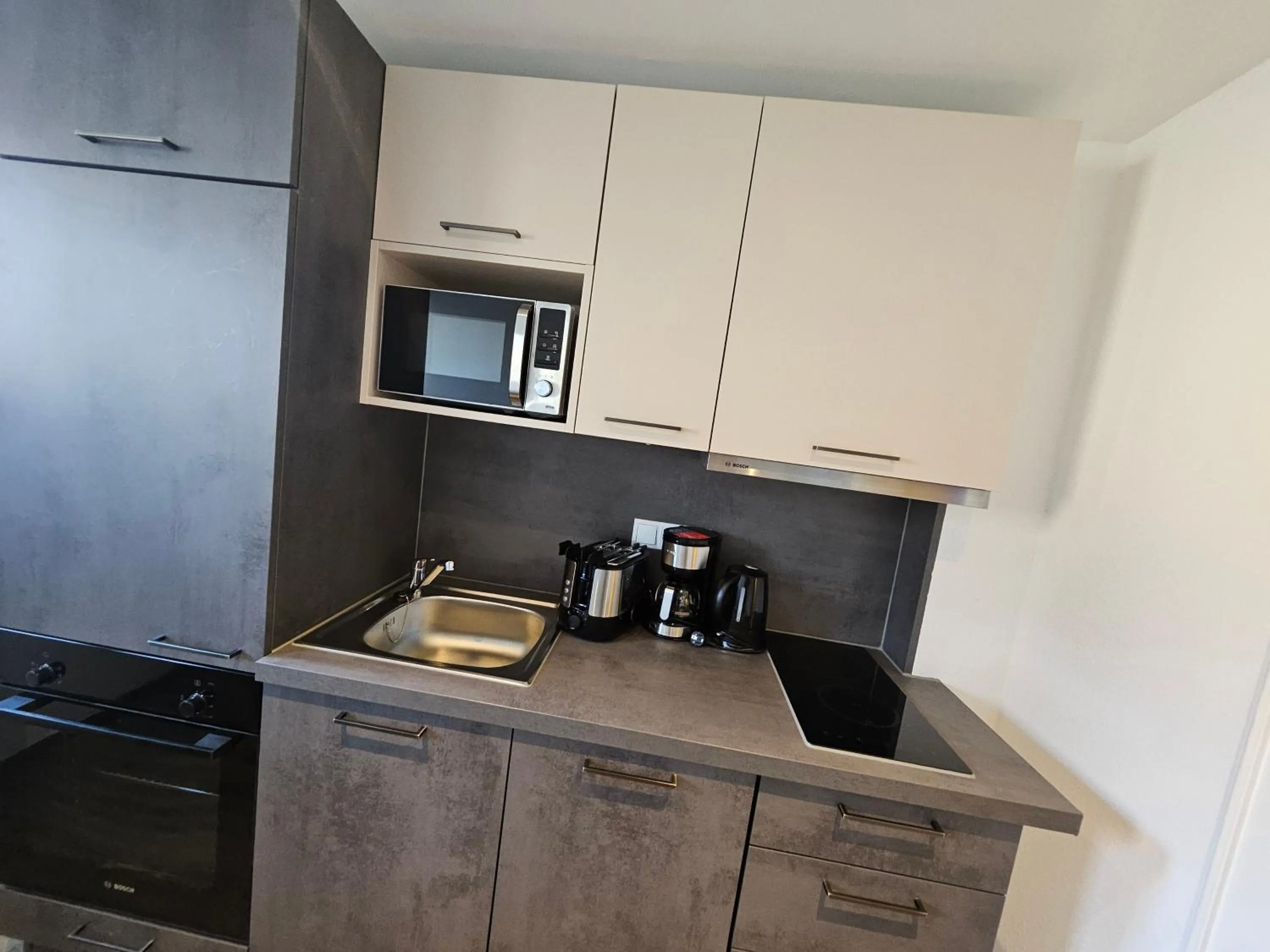 Kitchen or kitchenette in Hotelpension Oberauer Wagrain