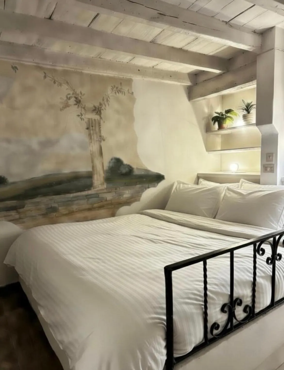 Bed in Navona Open Space Apartments