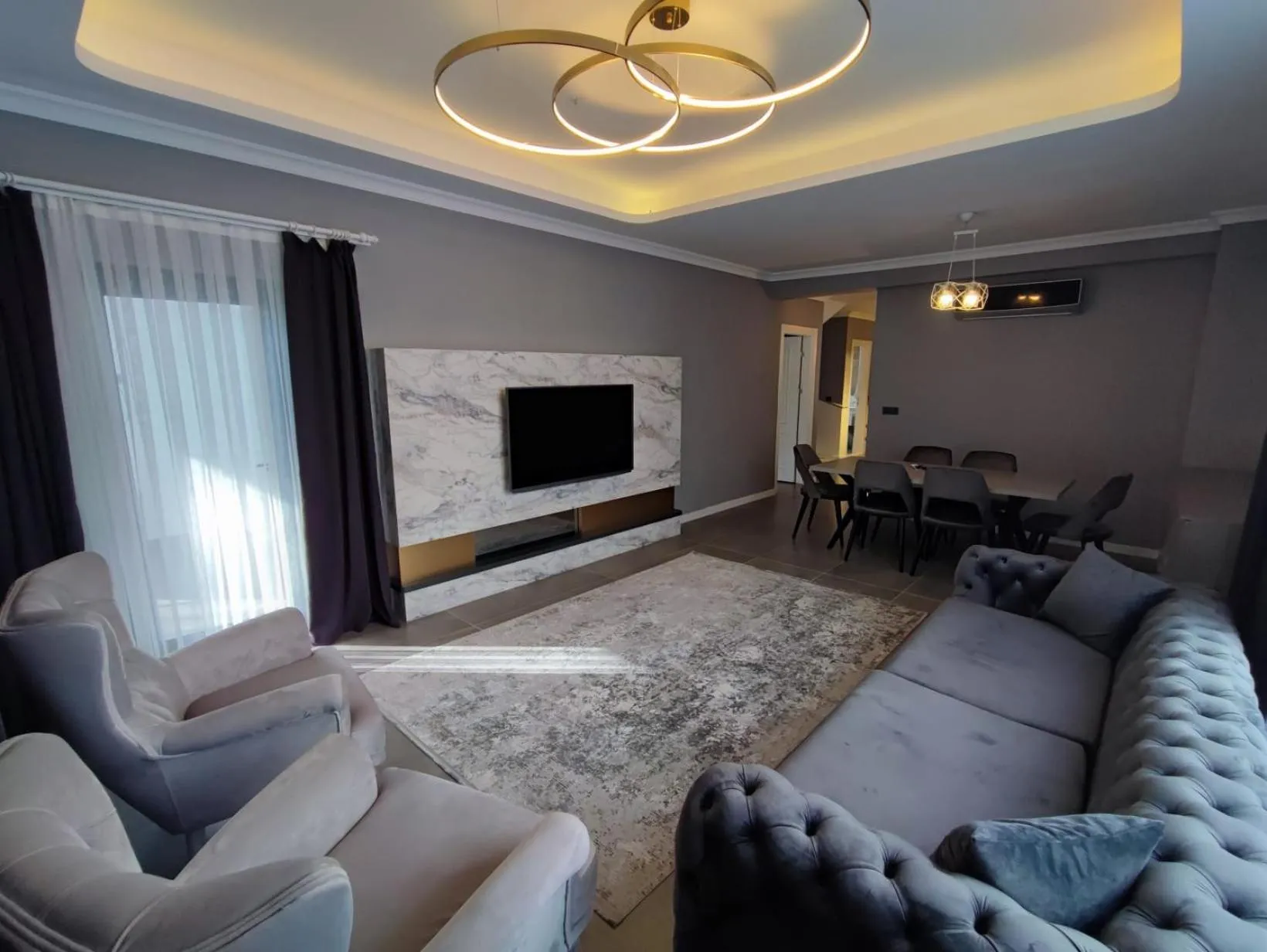 Communal lounge/ TV room in Aileena Hotel & Villas