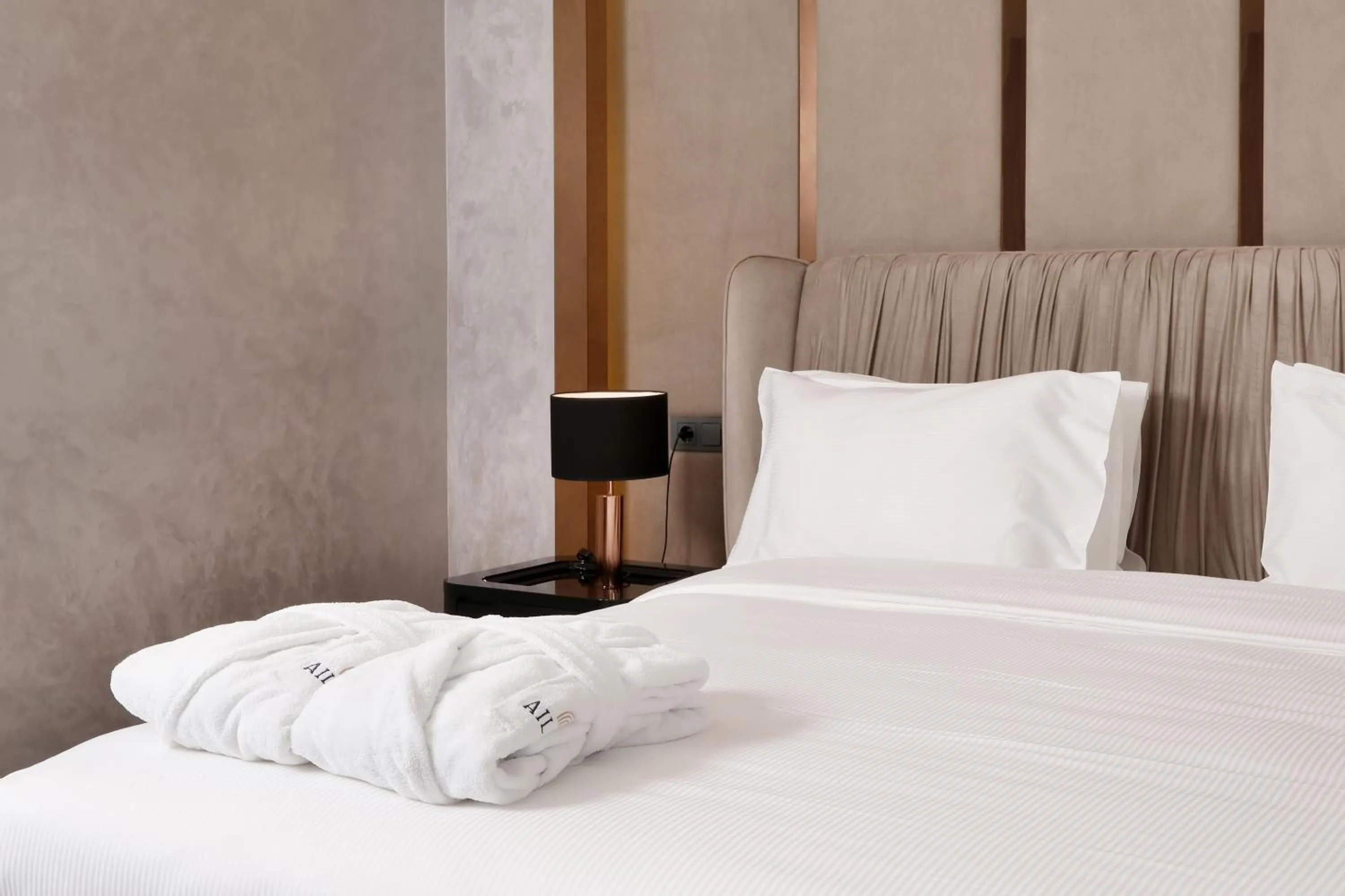 Bed in Aileena Hotel & Villas