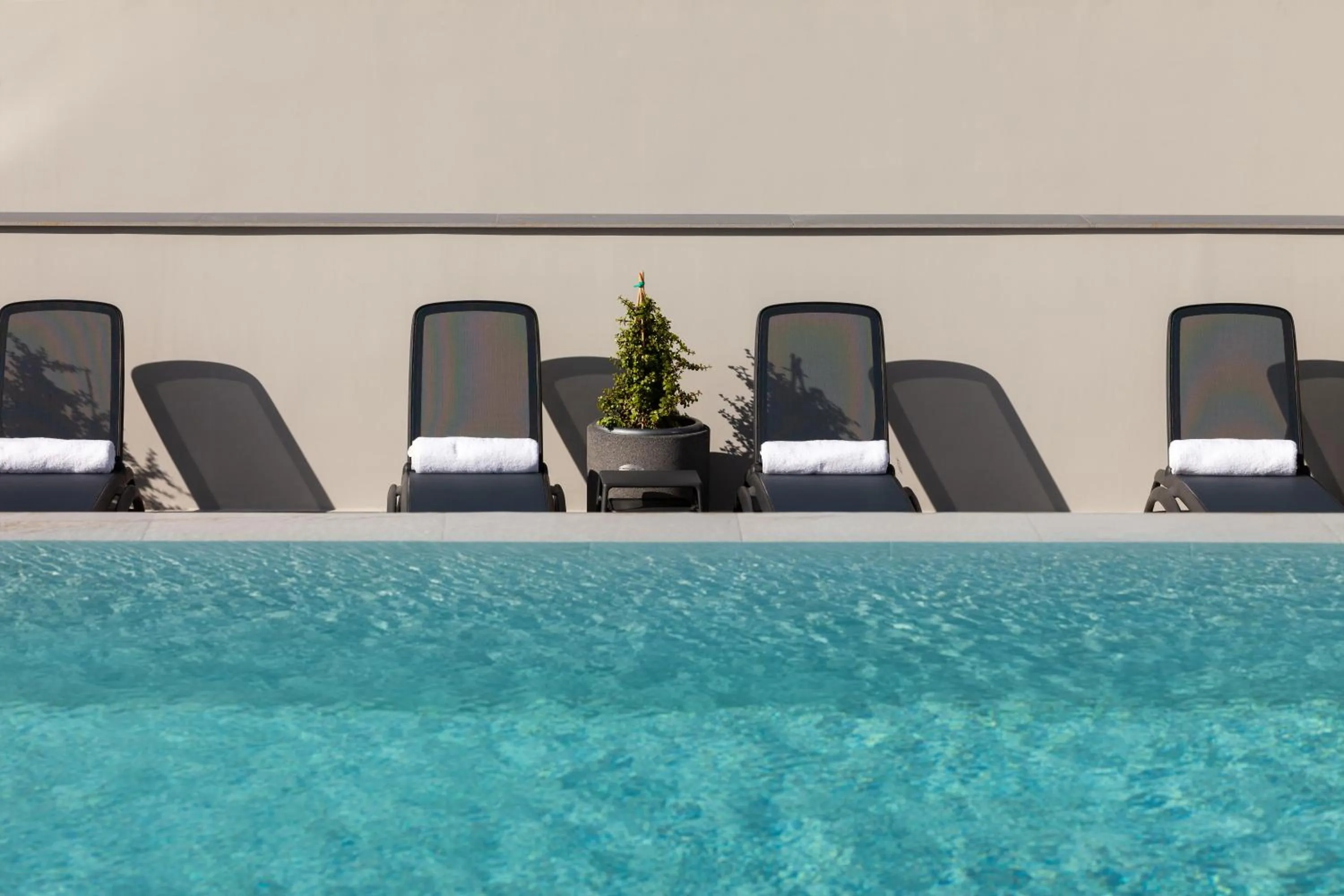 Swimming pool in ONLY Boutique Suites & Residences